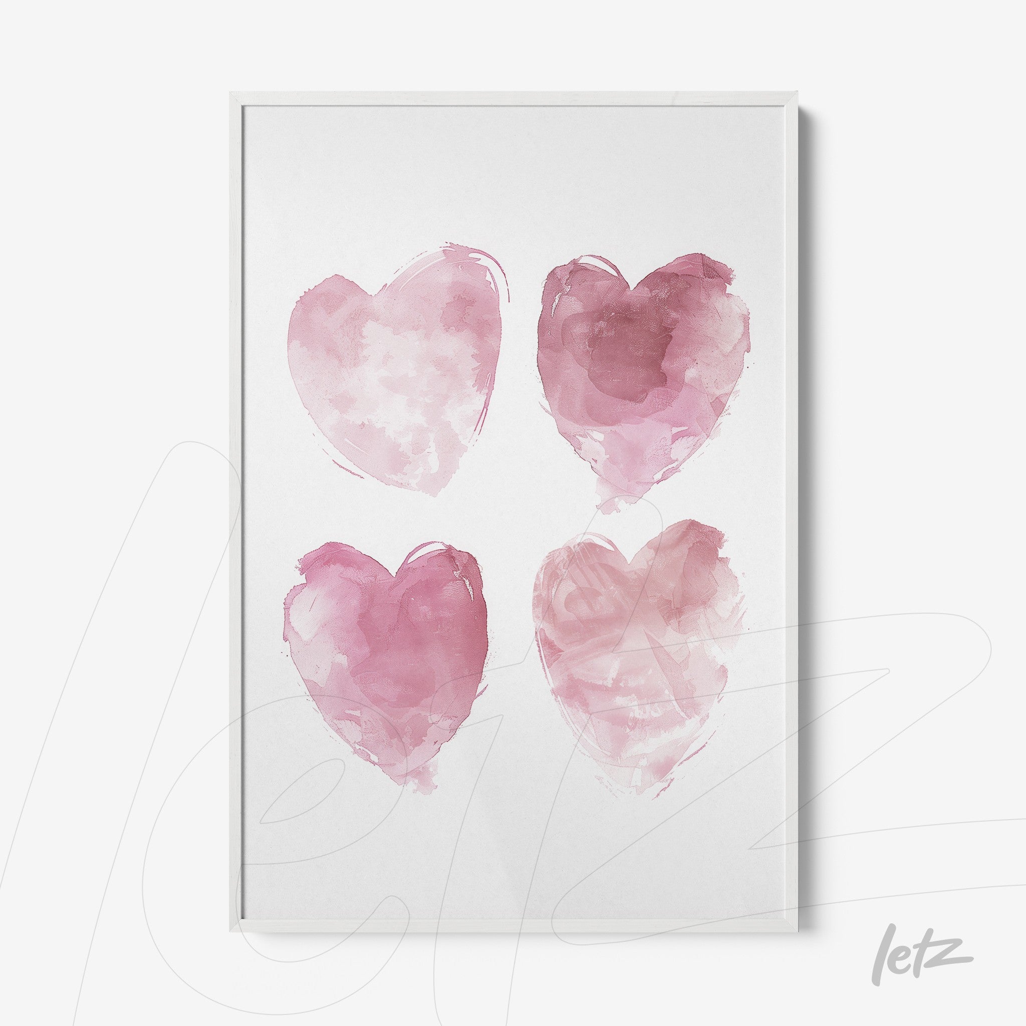 framed art featuring four stylized hearts in shades of pink