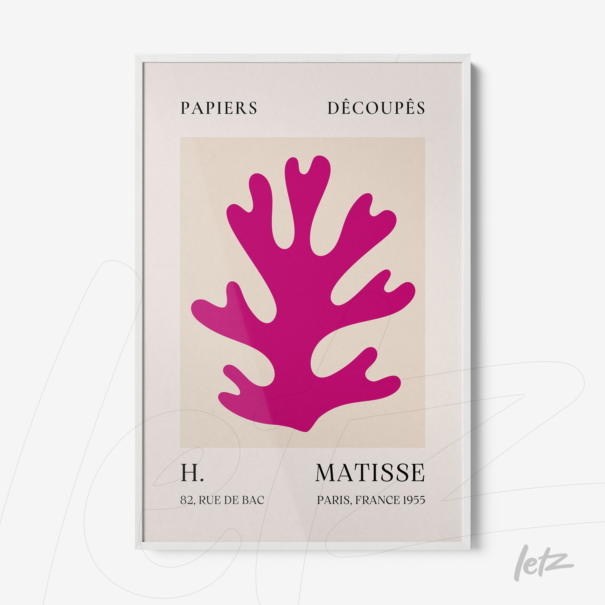 framed wall art featuring abstract pink coral on light background with thin white frame