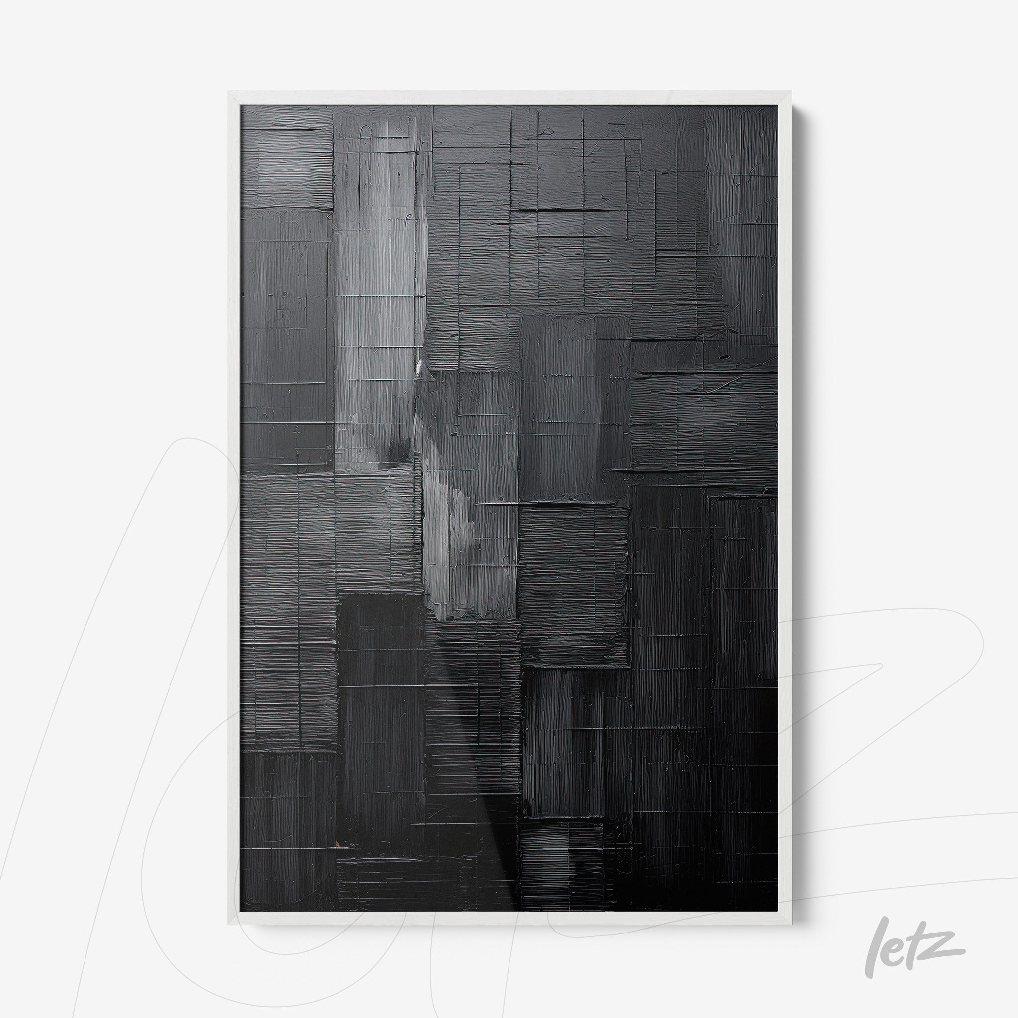 abstract wall art with textured black and gray design in white frame