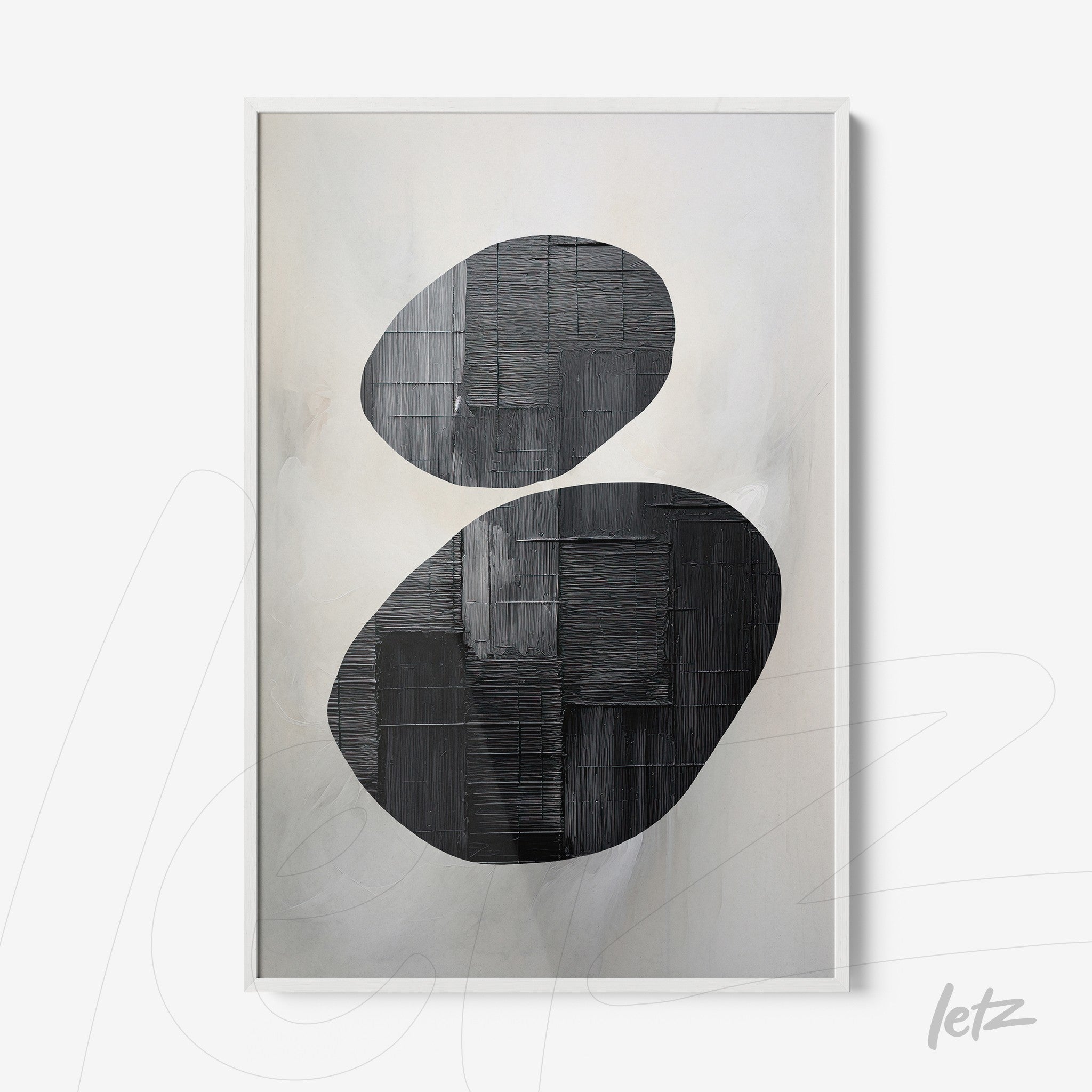 abstract wall art featuring black oval shapes on a soft light background with a white frame