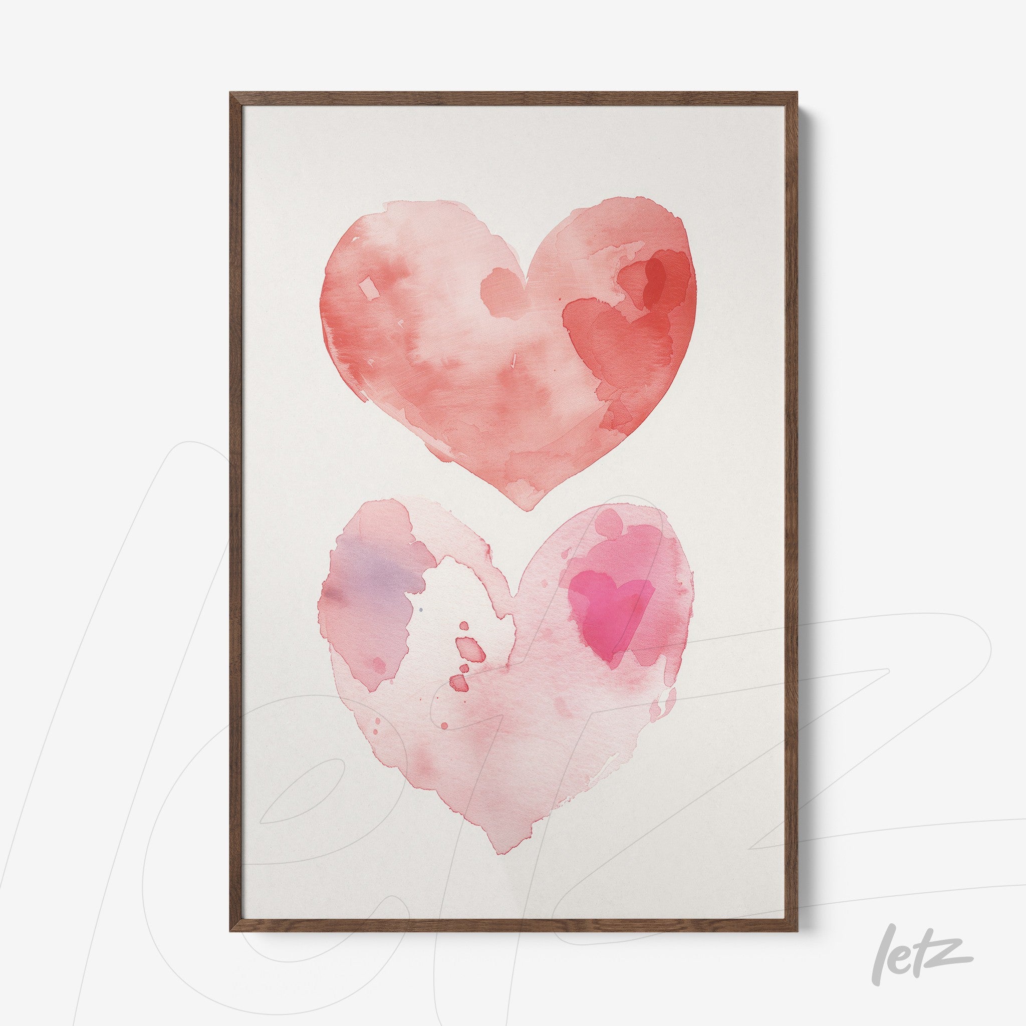 framed watercolor art of pink hearts in shades of rose, with dark wood frame