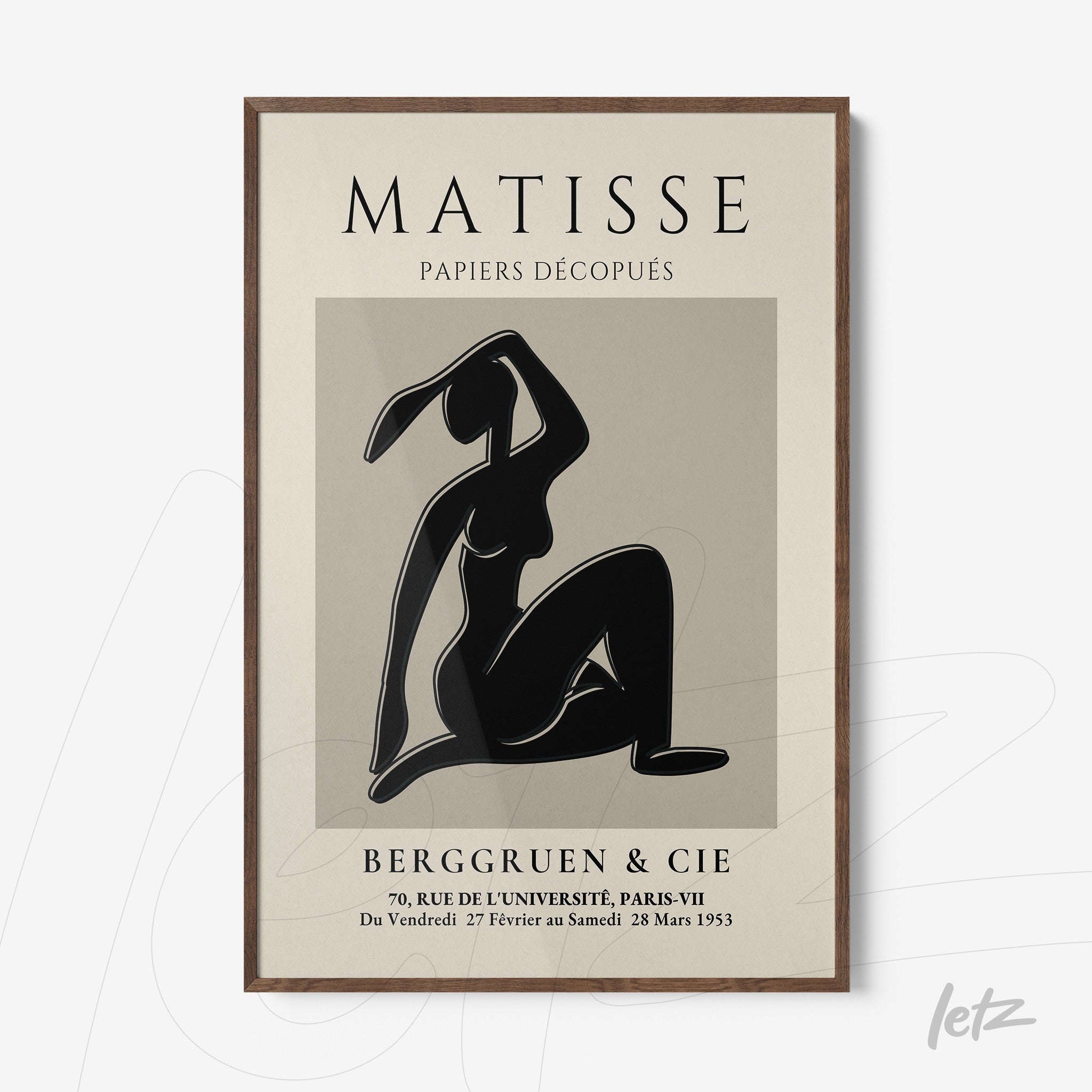 framed modern art piece in black and white depicting a dancing female figure, light wood frame