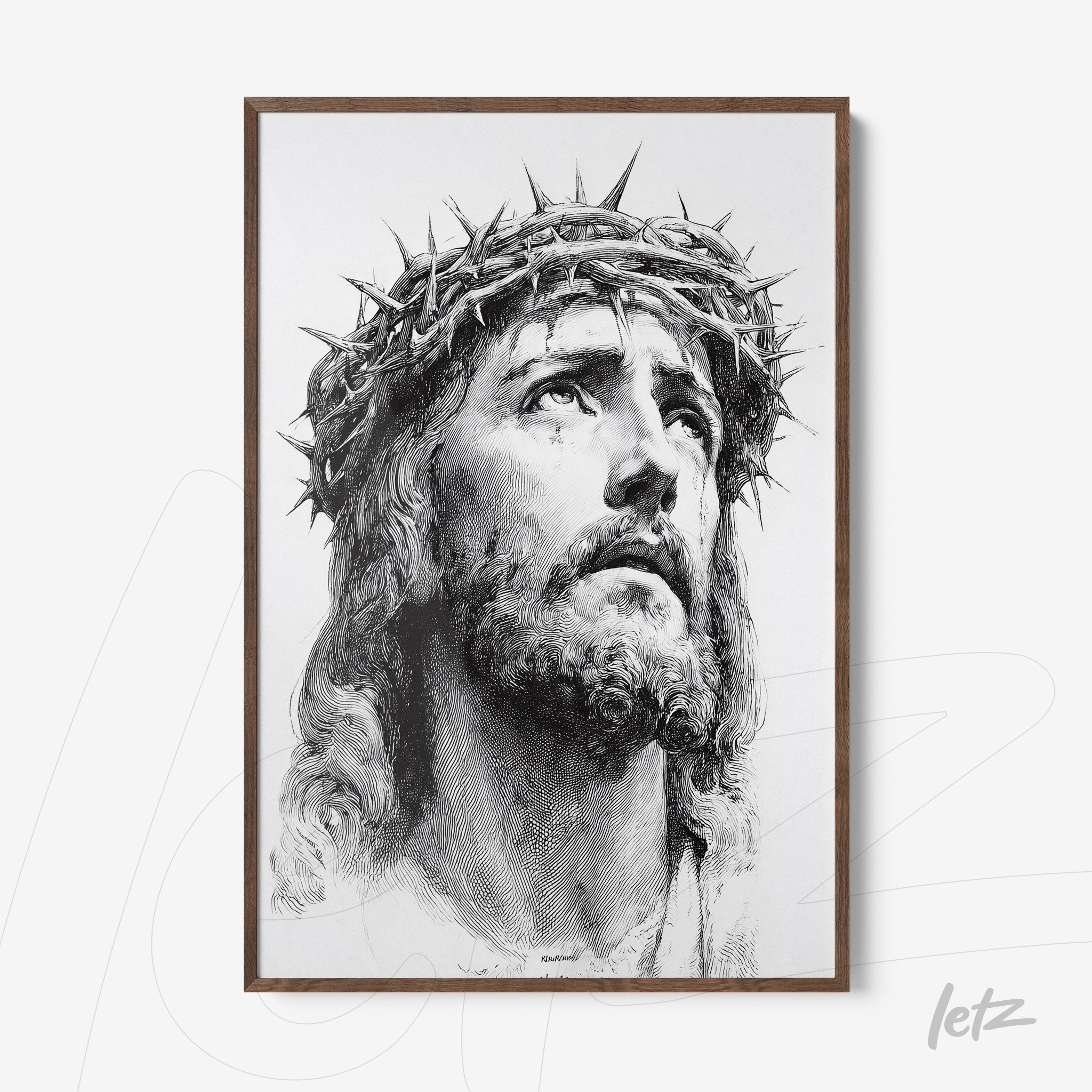 framed wall art showcasing a black and white portrait of Jesus Christ wearing a crown of thorns