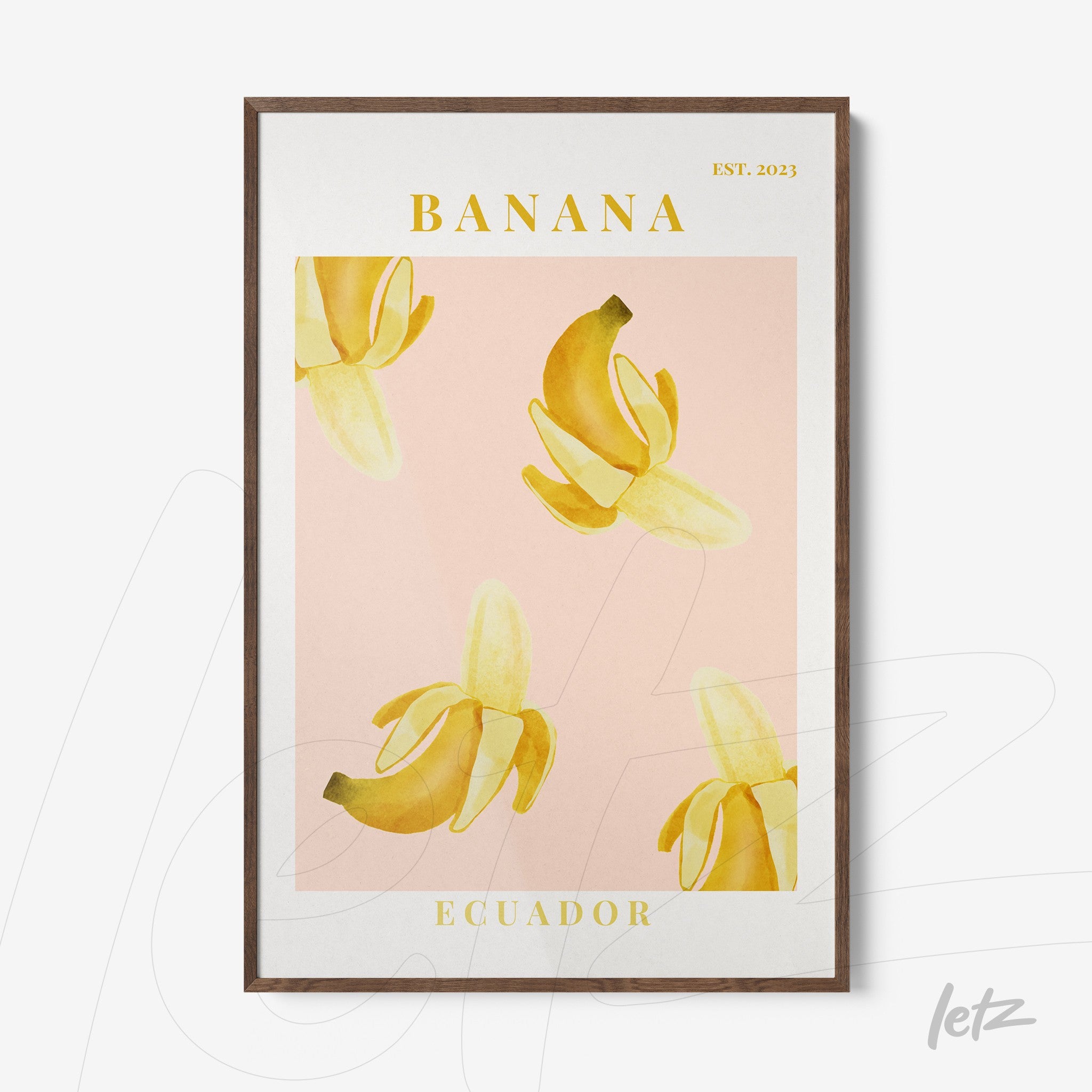 framed wall art featuring yellow bananas on a pink background, with 'BANANA' text at the top and 'ECUADOR' at the bottom