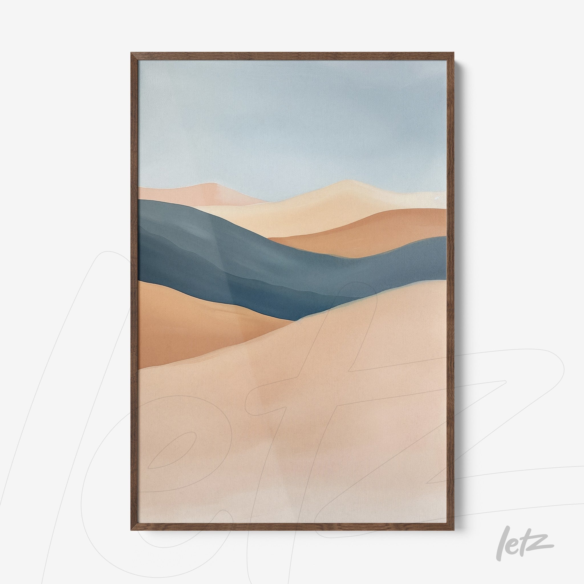 framed abstract art of landscapes in shades of beige and blue with dark wood frame