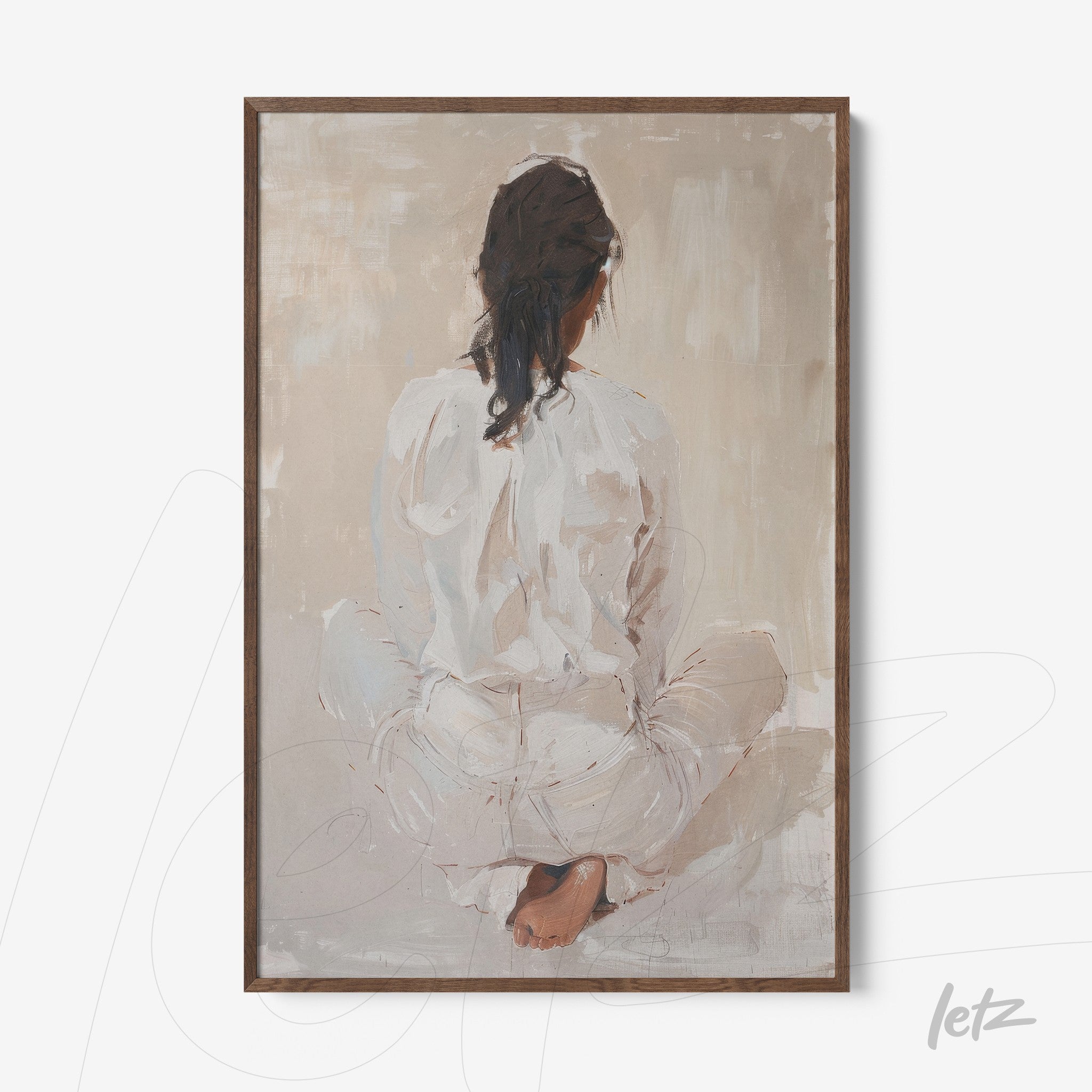framed artwork of a seated female figure from behind, wearing white clothing and with loose hair, in a light wooden frame