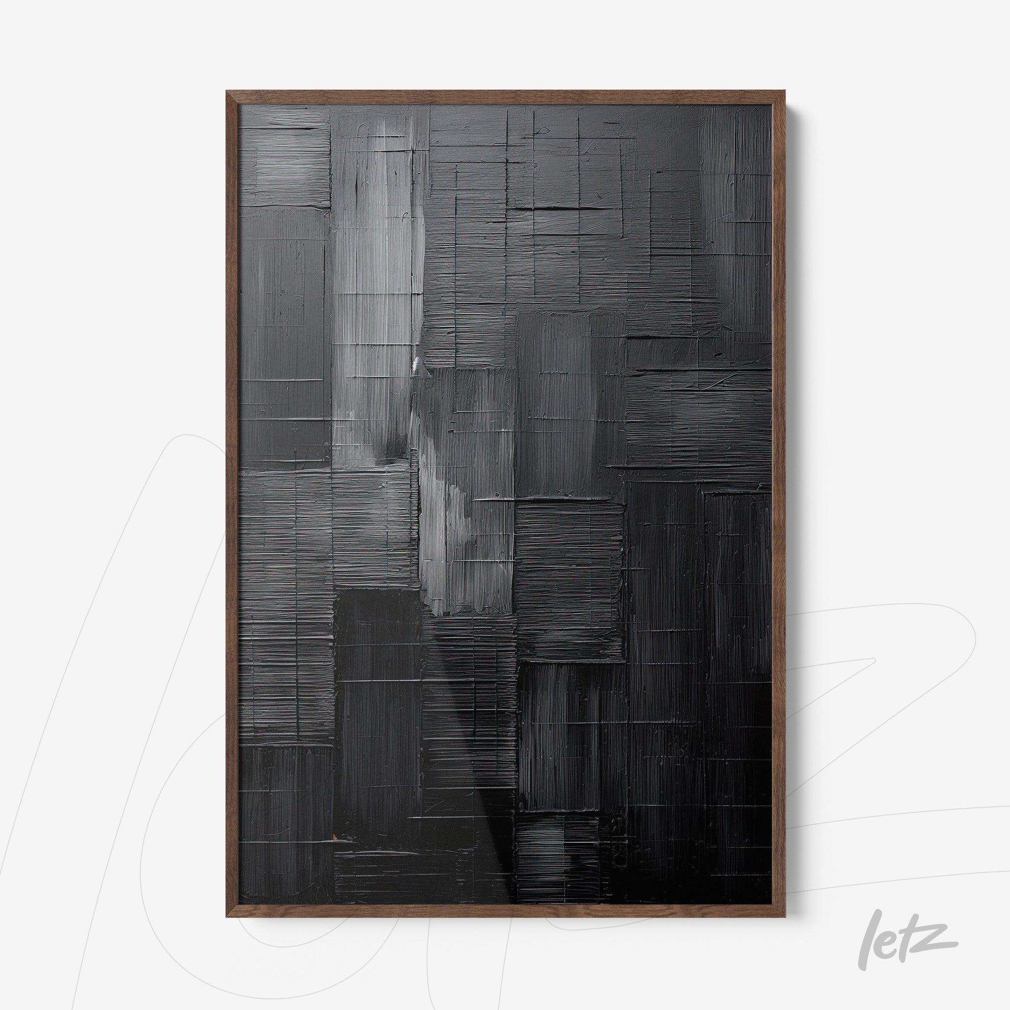abstract wall art featuring black and gray tones with raised texture and dark wood frame