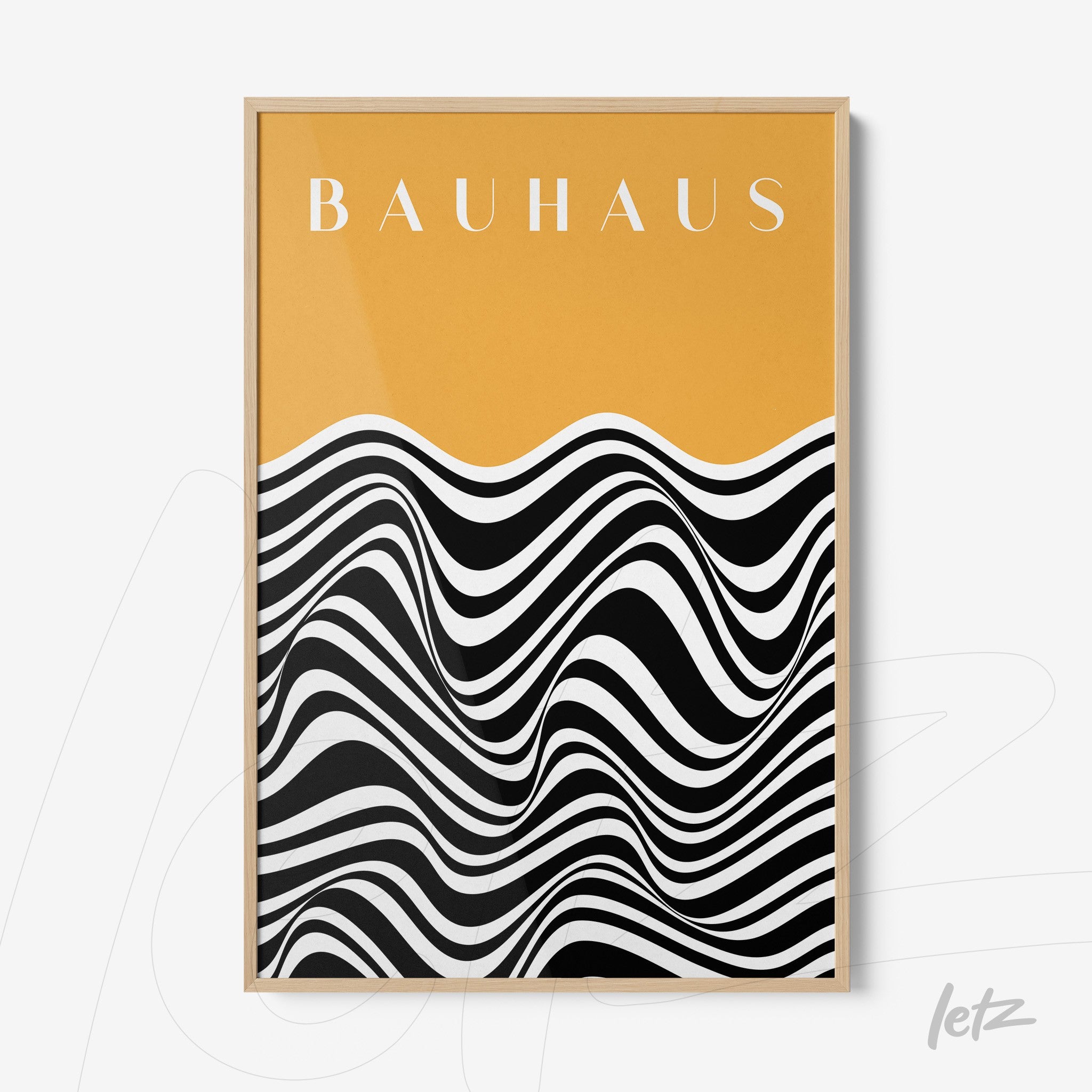 poster print featuring black and white wavy design on orange background with 'bauhaus' text in light wooden frame