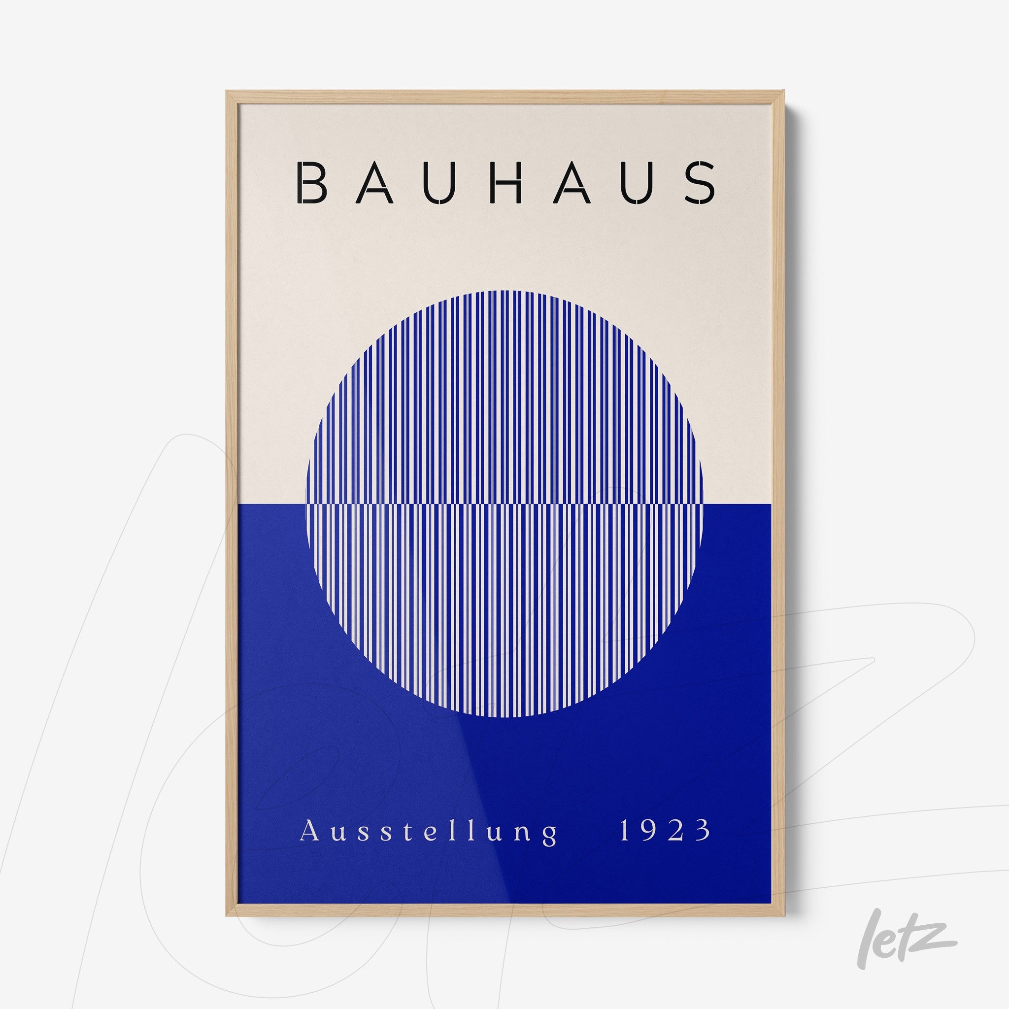 bauhaus style poster print with geometric blue and white design in light wood frame
