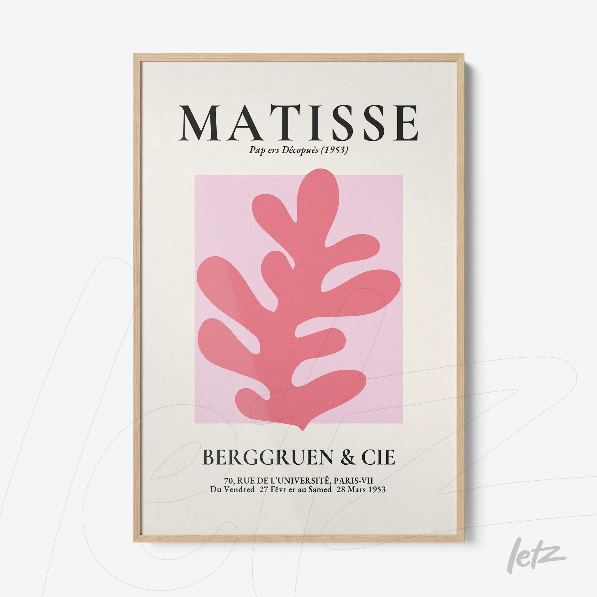 framed art inspired by Matisse featuring a pink leaf design on a light background with a light wood frame