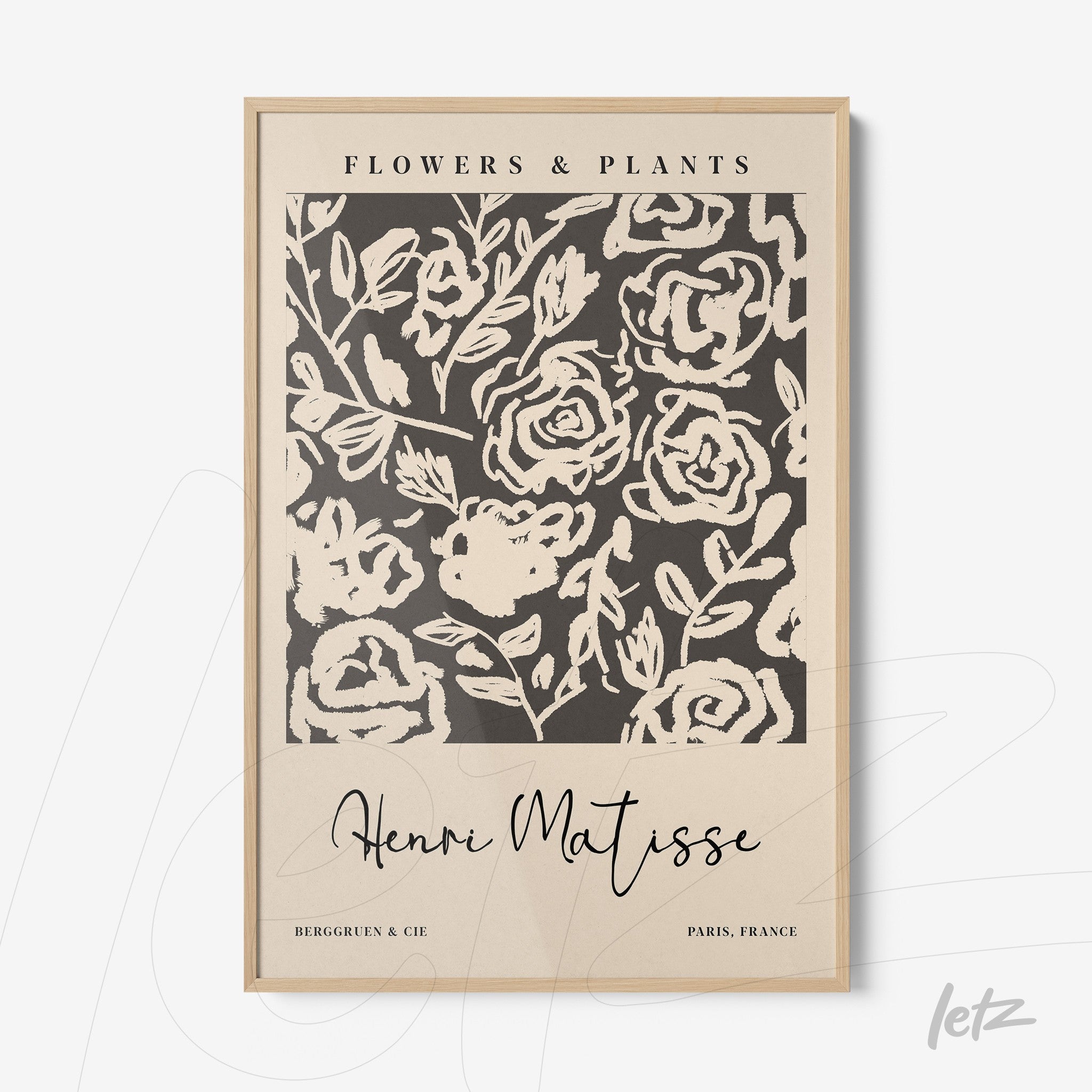 framed wall art featuring stylized floral design with light wood frame and beige background