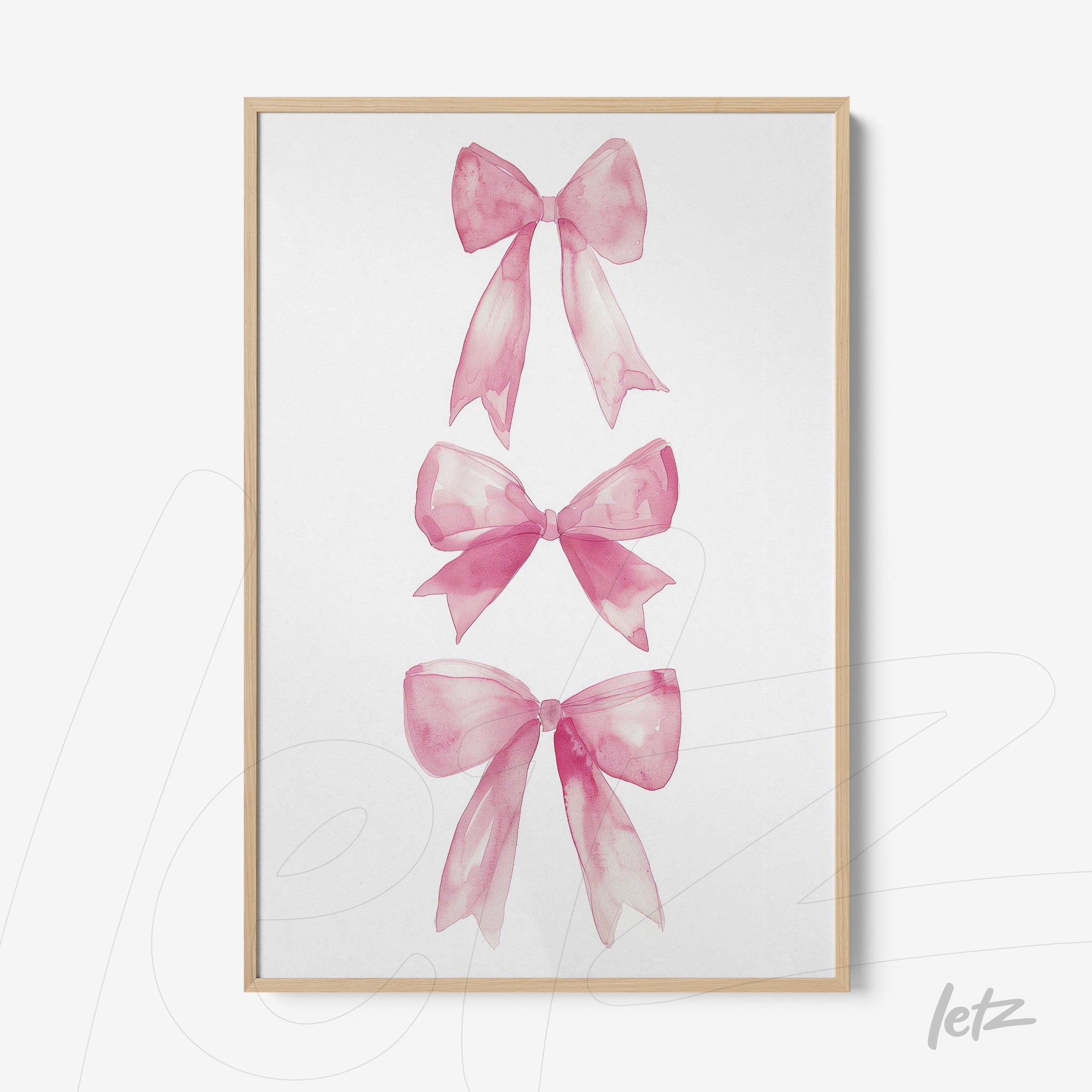 framed artwork featuring three pink watercolor bows with light wooden frame