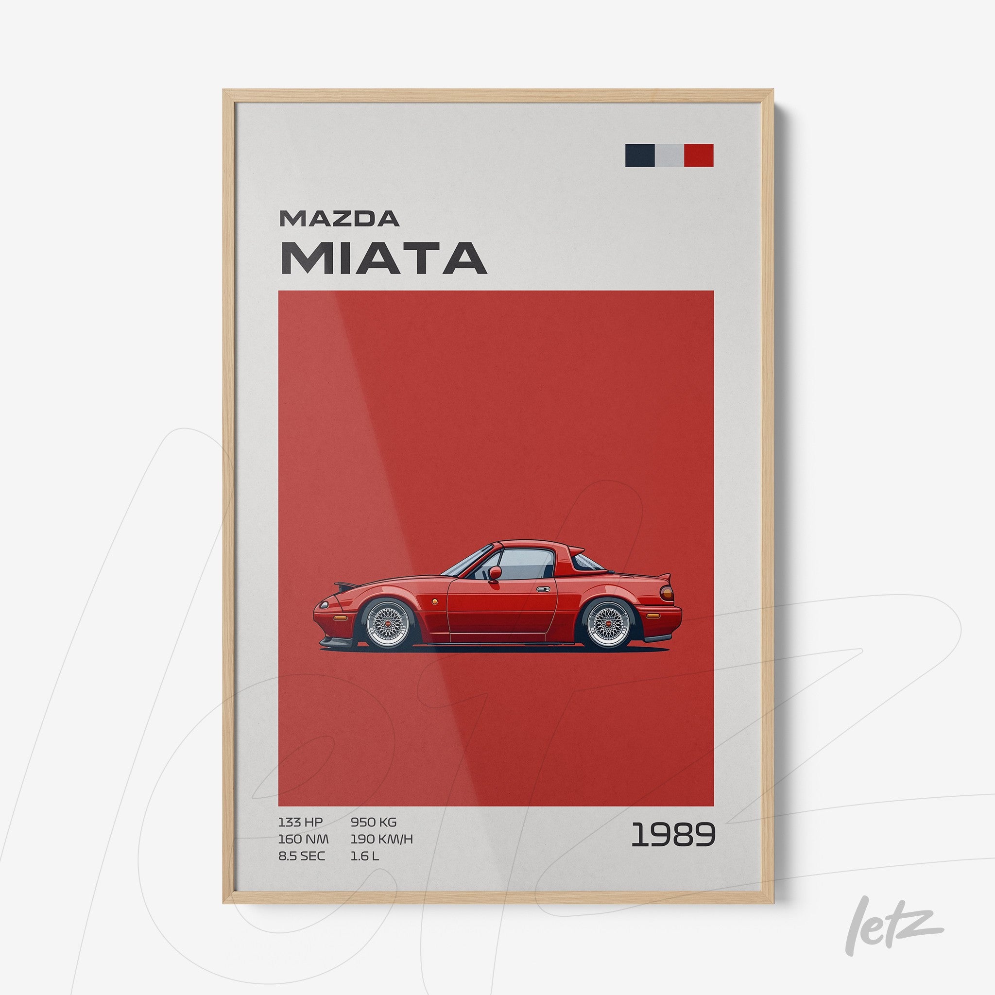 framed wall art featuring a red Mazda Miata sports car illustration on a red background with a light frame