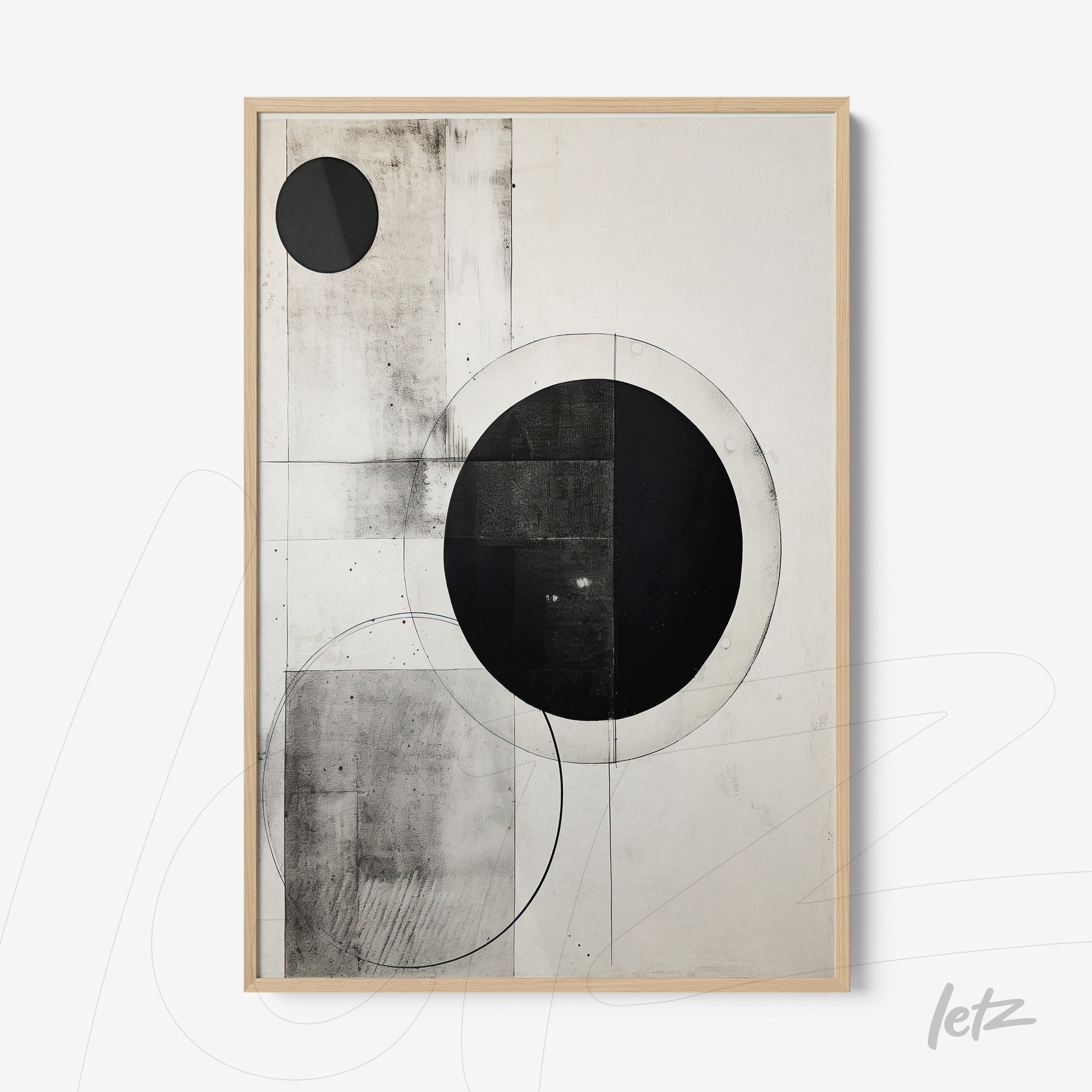 abstract black and white wall art featuring geometric circles in a minimalist composition with light wood frame