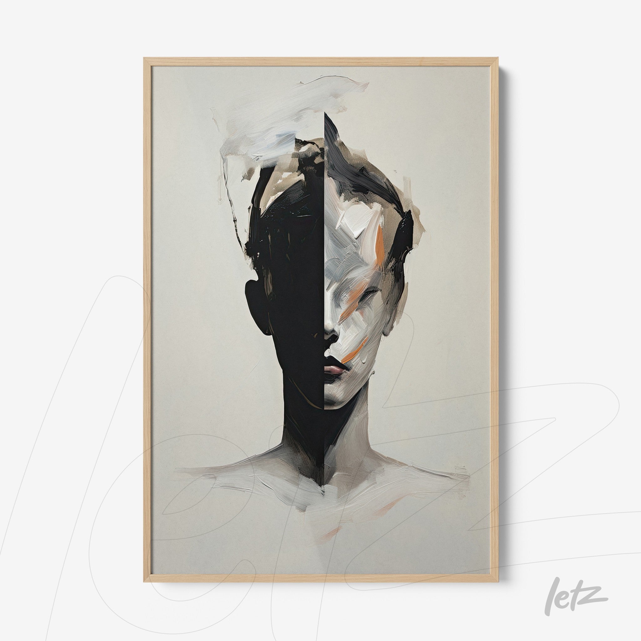 abstract artwork featuring a human face with one half in dark tones and the other half in soft hues in a light wood frame