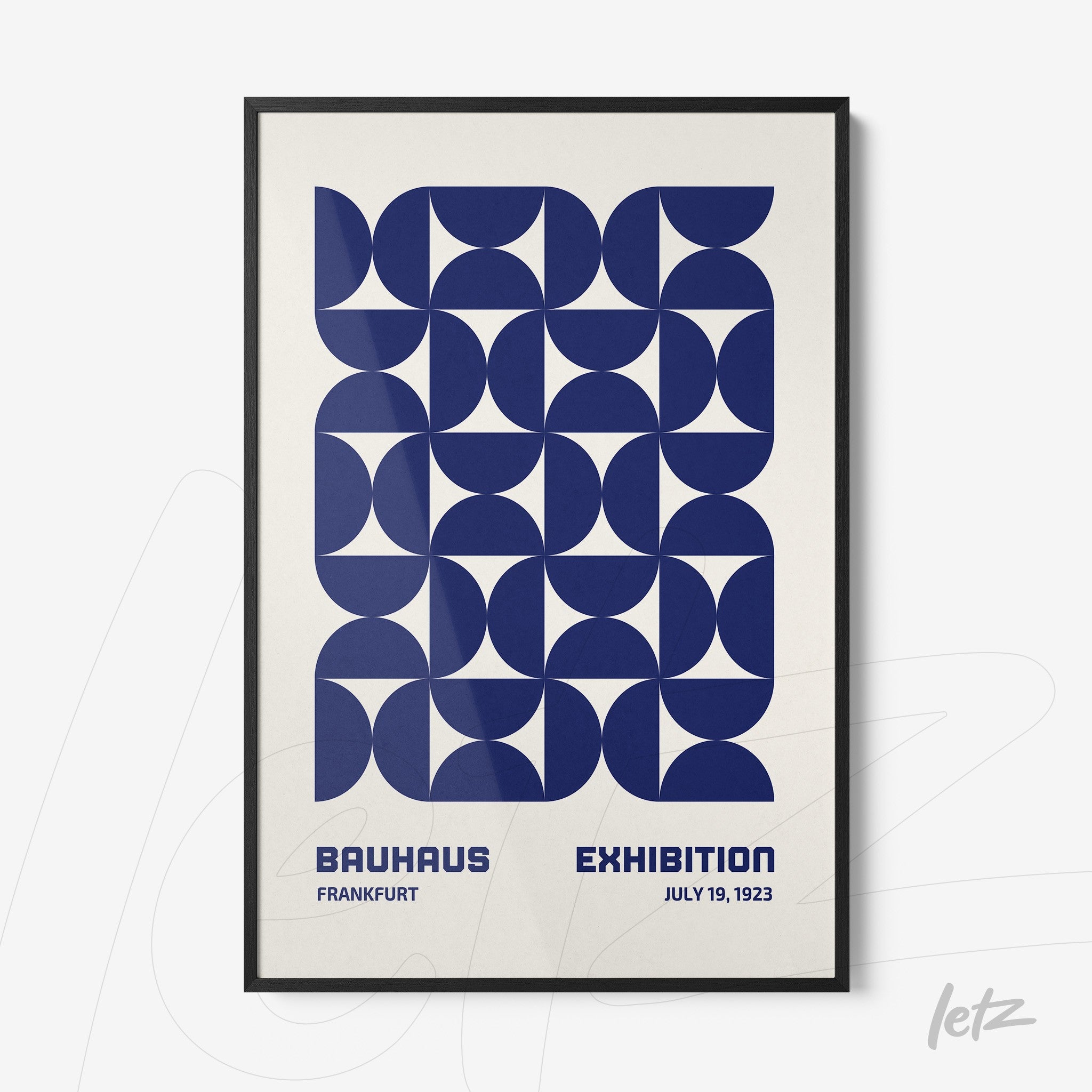 bauhaus style poster print with blue geometric patterns in thin black frame