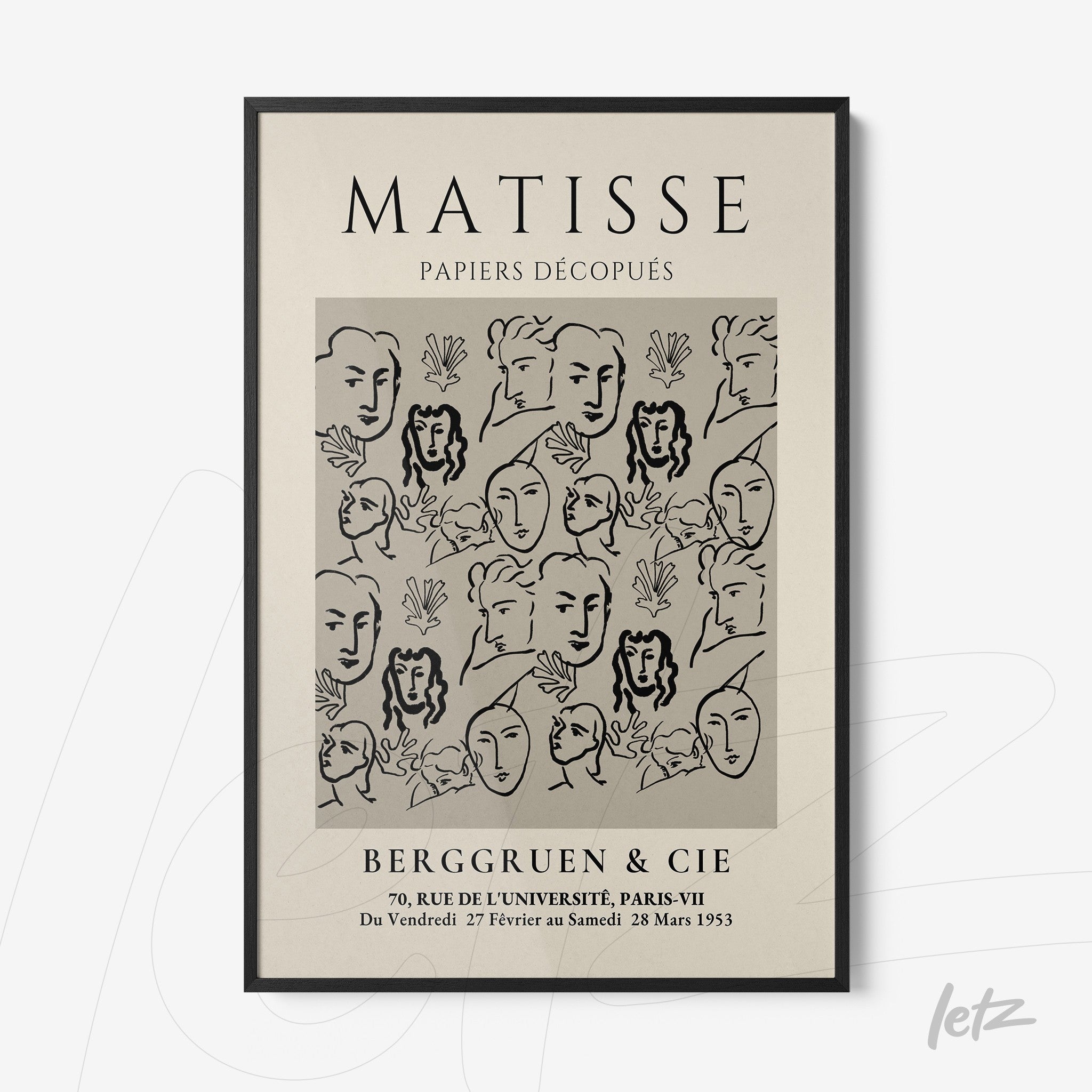 framed wall art in minimalist style featuring linear faces on gray background with black frame