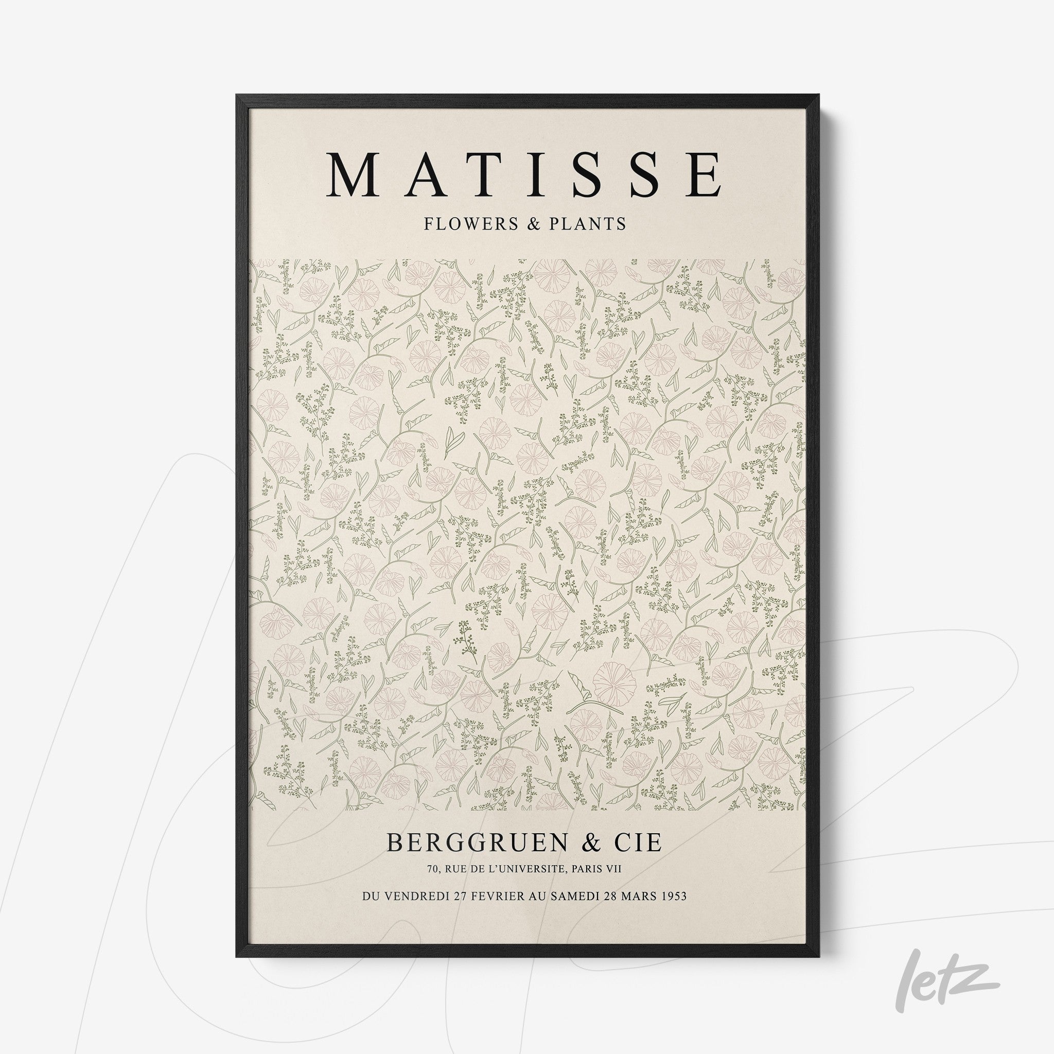 framed wall art featuring a vintage style illustration of flowers and plants with a black frame and light background
