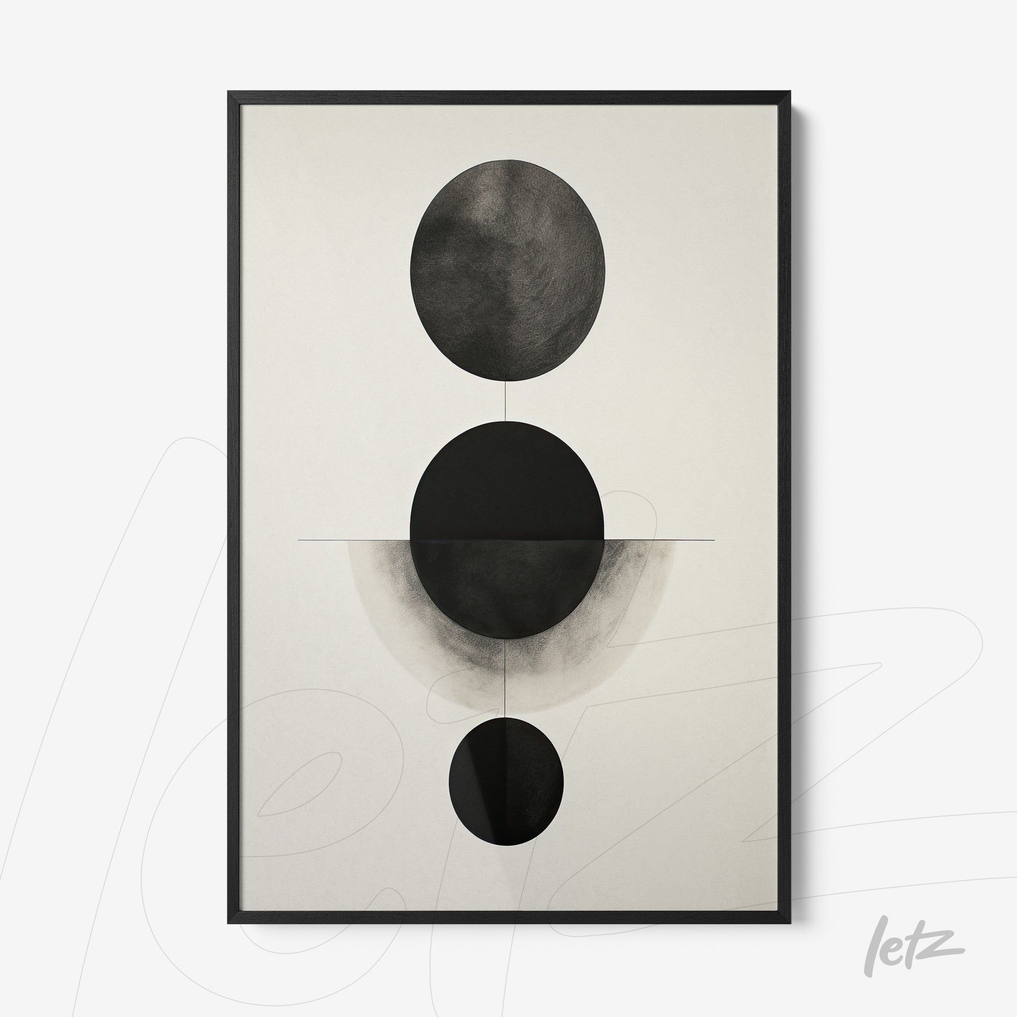 abstract wall art in black and white featuring circles on a light background with a black frame