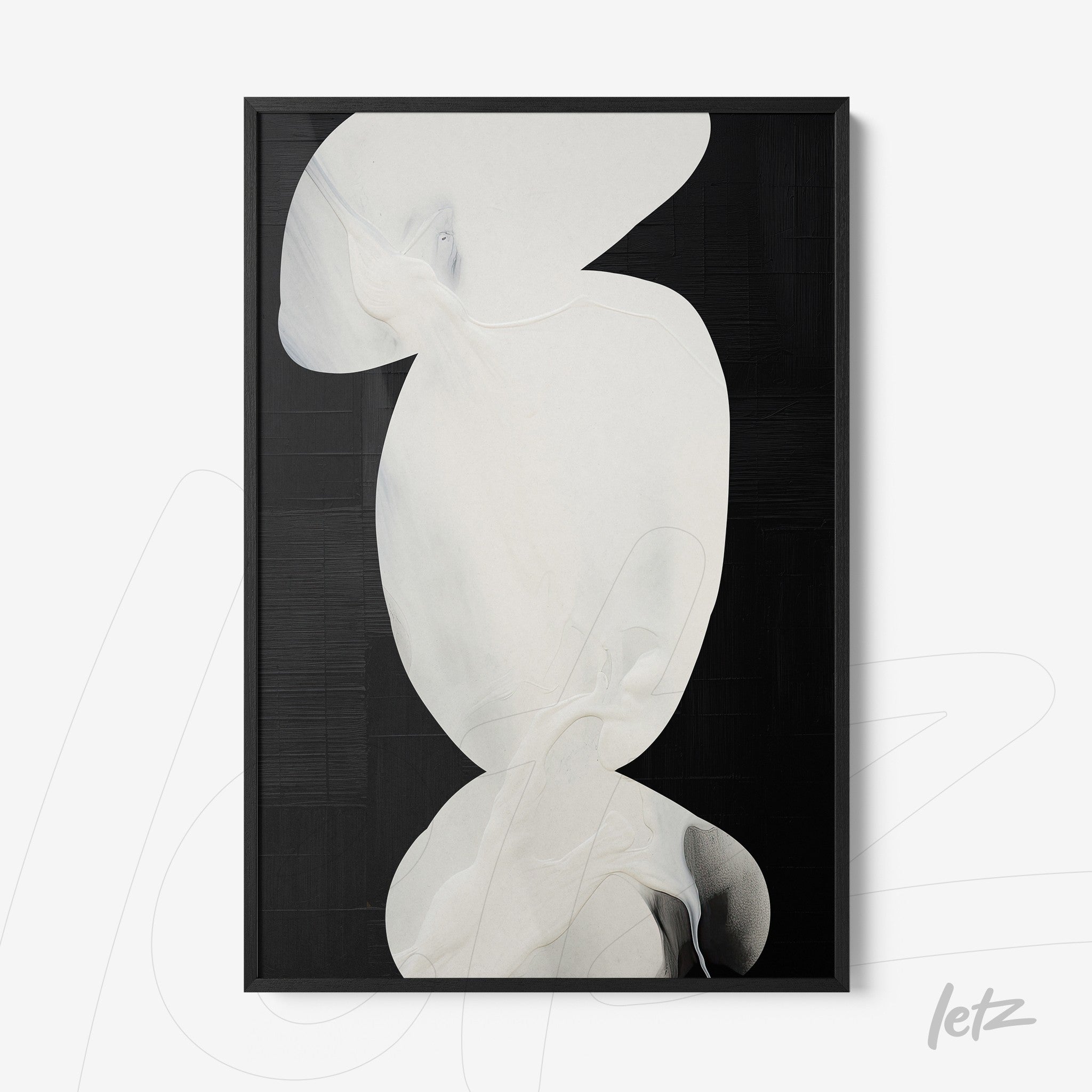 abstract art piece in white tones against a black background, framed in black