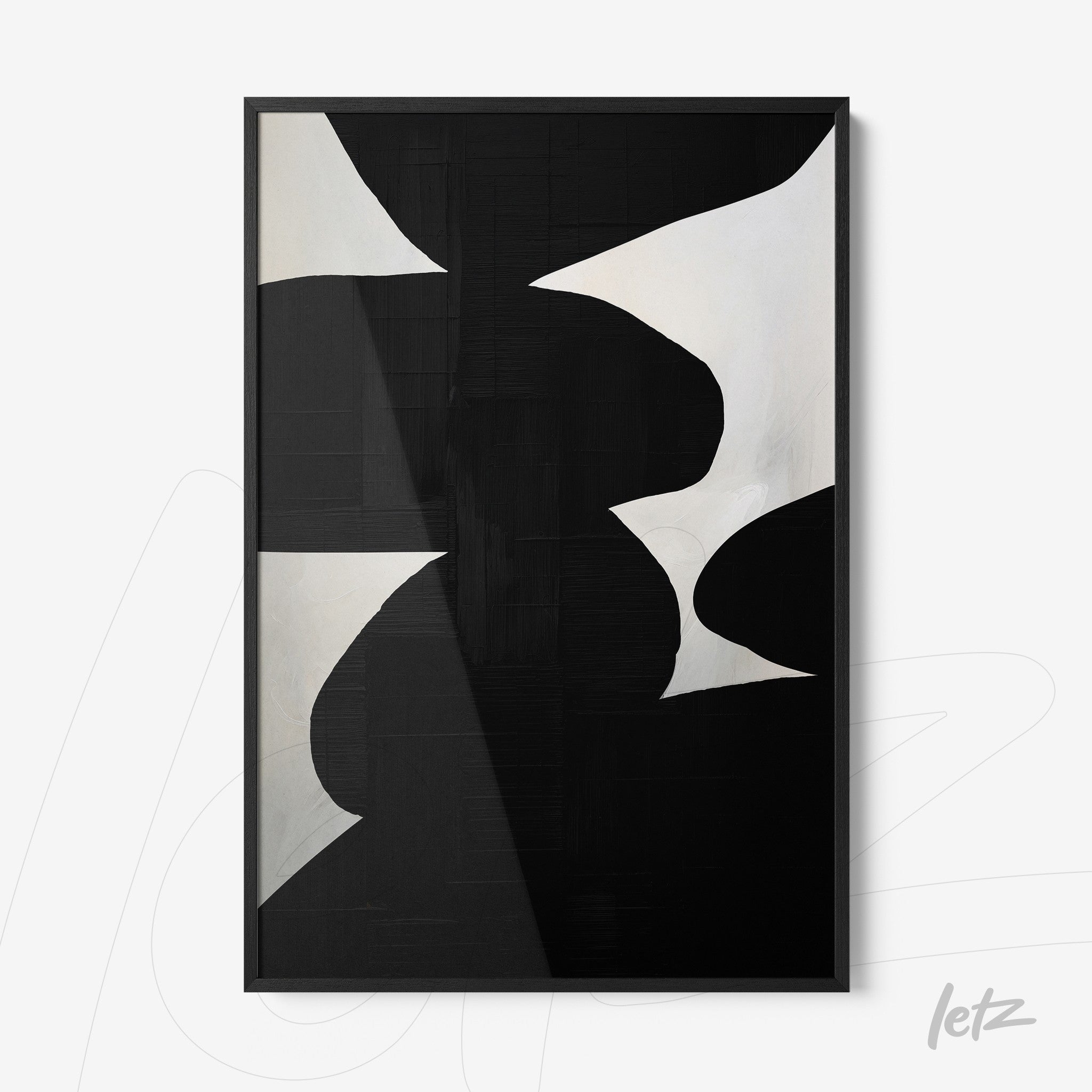 abstract wall art in black and white featuring geometric shapes, framed in black