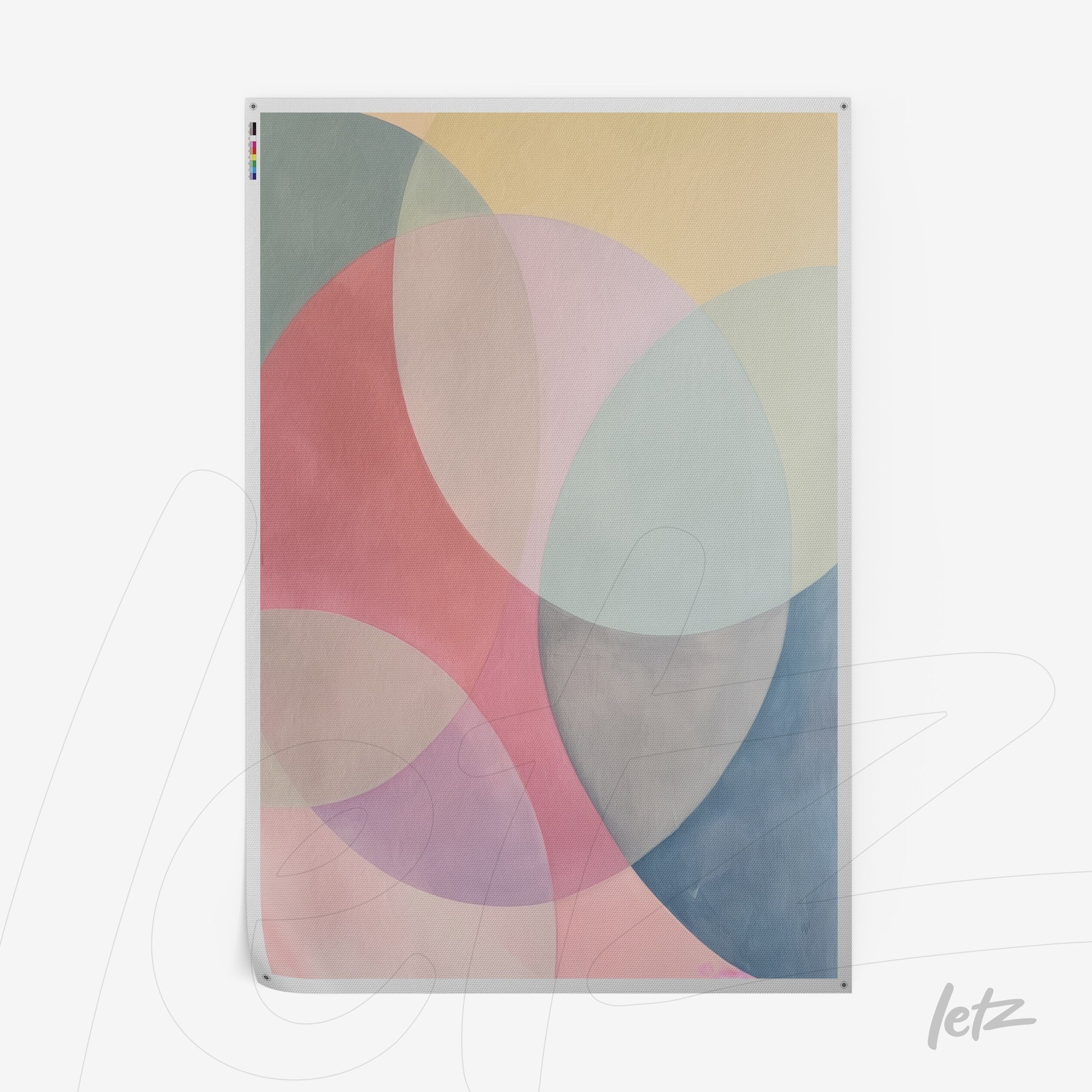 abstract wall art in soft shades of pink, blue, and yellow featuring overlapping circular shapes