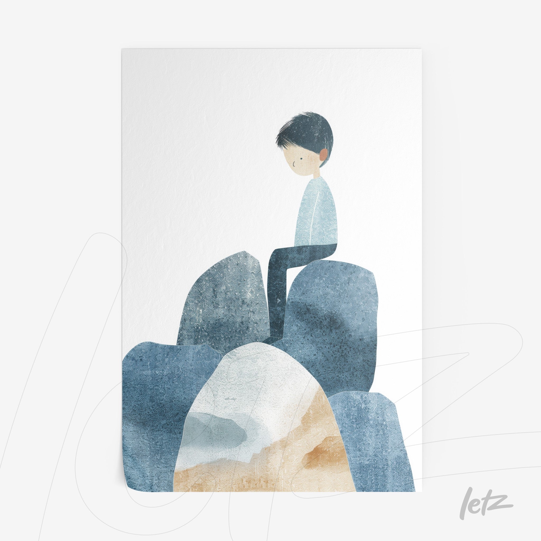 framed wall art featuring a young boy sitting on blue and beige rocks against a light background