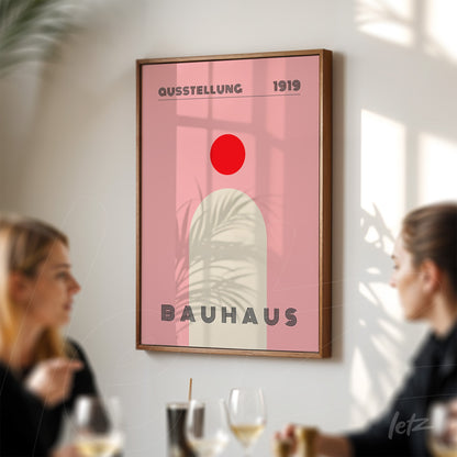 vintage bauhaus style poster framed and displayed on a sunlit wall