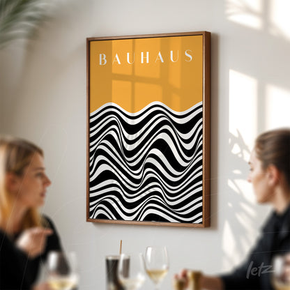 poster featuring black and white wavy design on a vibrant yellow background with a wooden frame