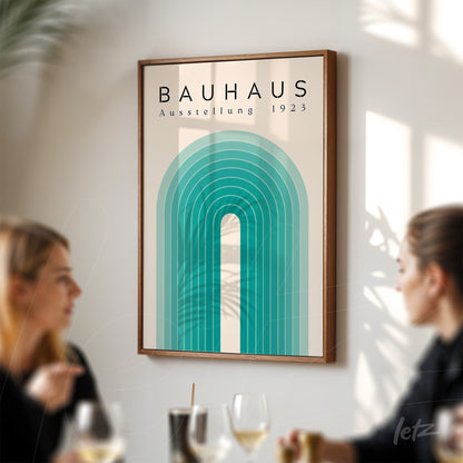 poster print of geometric bauhaus style art with green arch framed in wood displayed on modern lounge wall