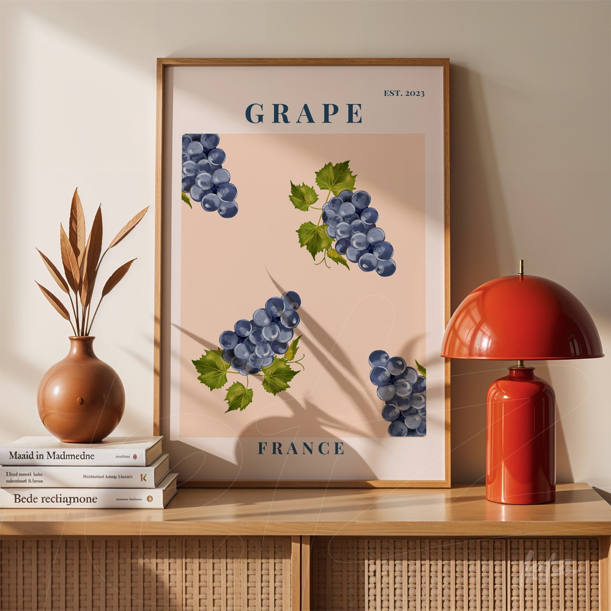framed artwork featuring blue grapes on a pink background with text 'GRAPE' and 'FRANCE'
