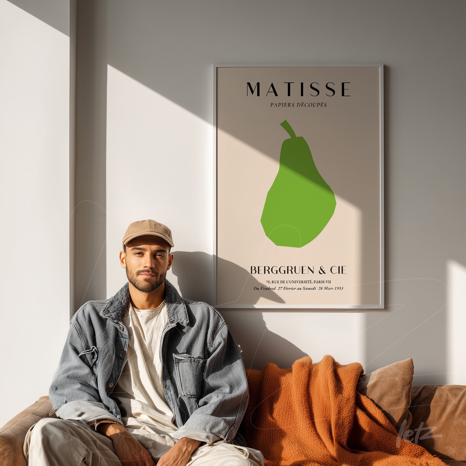 framed wall art featuring a green pear illustration by Matisse on a nude background, displayed on a well-lit wall with natural light