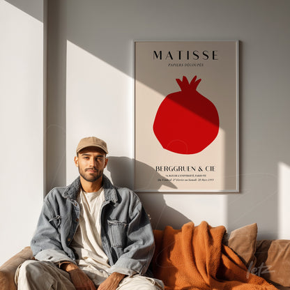 decorative wall art featuring henri matisse's design with a red pomegranate on a light backdrop, highlighting a minimalist composition