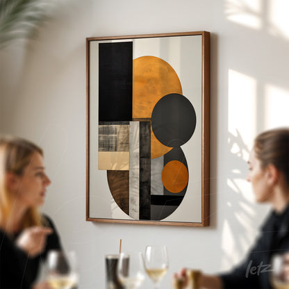 abstract wall art in wooden frame featuring geometric shapes in orange, black, and gray tones