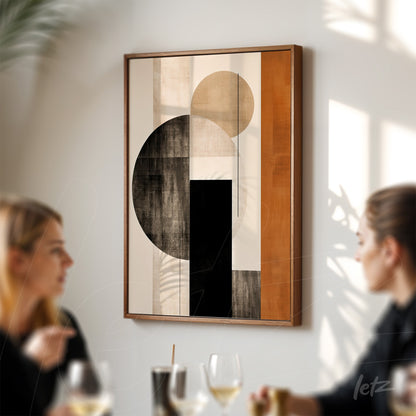abstract wall art featuring geometric shapes in earthy tones with wooden frame displayed on a light wall