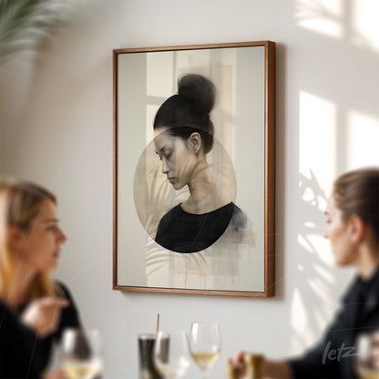 framed wall art featuring a profile portrait of a woman in soft tones with a light wooden frame