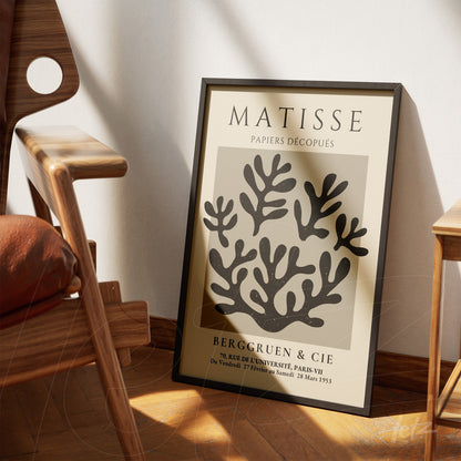 decorative framed abstract art inspired by Matisse displayed next to a wooden chair