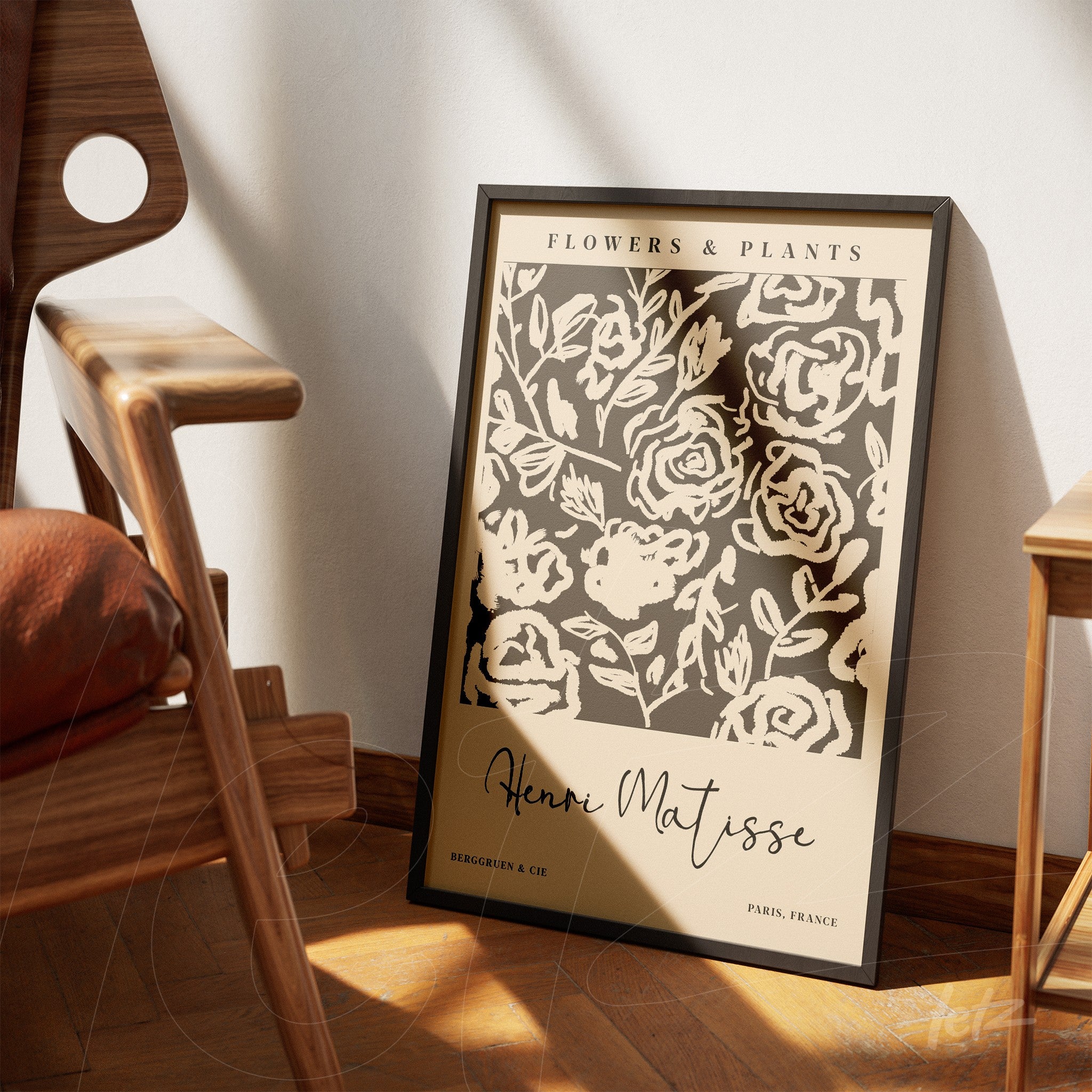framed wall art in black frame featuring neutral-tone botanical design showcasing stylized flowers by Henri Matisse