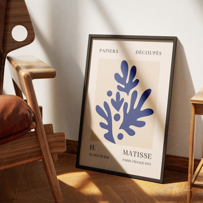 framed modern art print featuring organic shapes in navy blue on a cream background