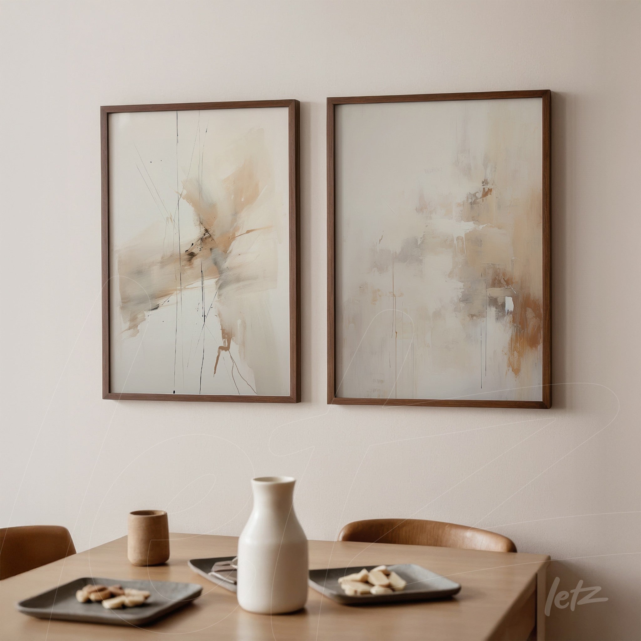 composition of abstract framed wall art in light brown frames featuring pastel tones of cream and beige on a light wall