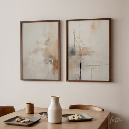 set of abstract wall art in neutral tones with brown frames, displayed on a light wall