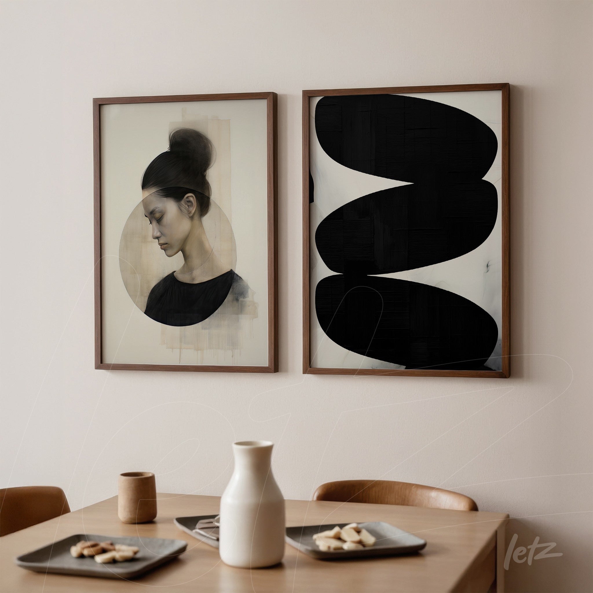 composition of two framed artworks on light wall, featuring a profile portrait with a soft textured light circular background next to an abstract piece with black shapes on white background