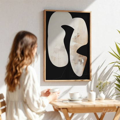 abstract art framed print in light wood frame displayed in a bright setting with black background