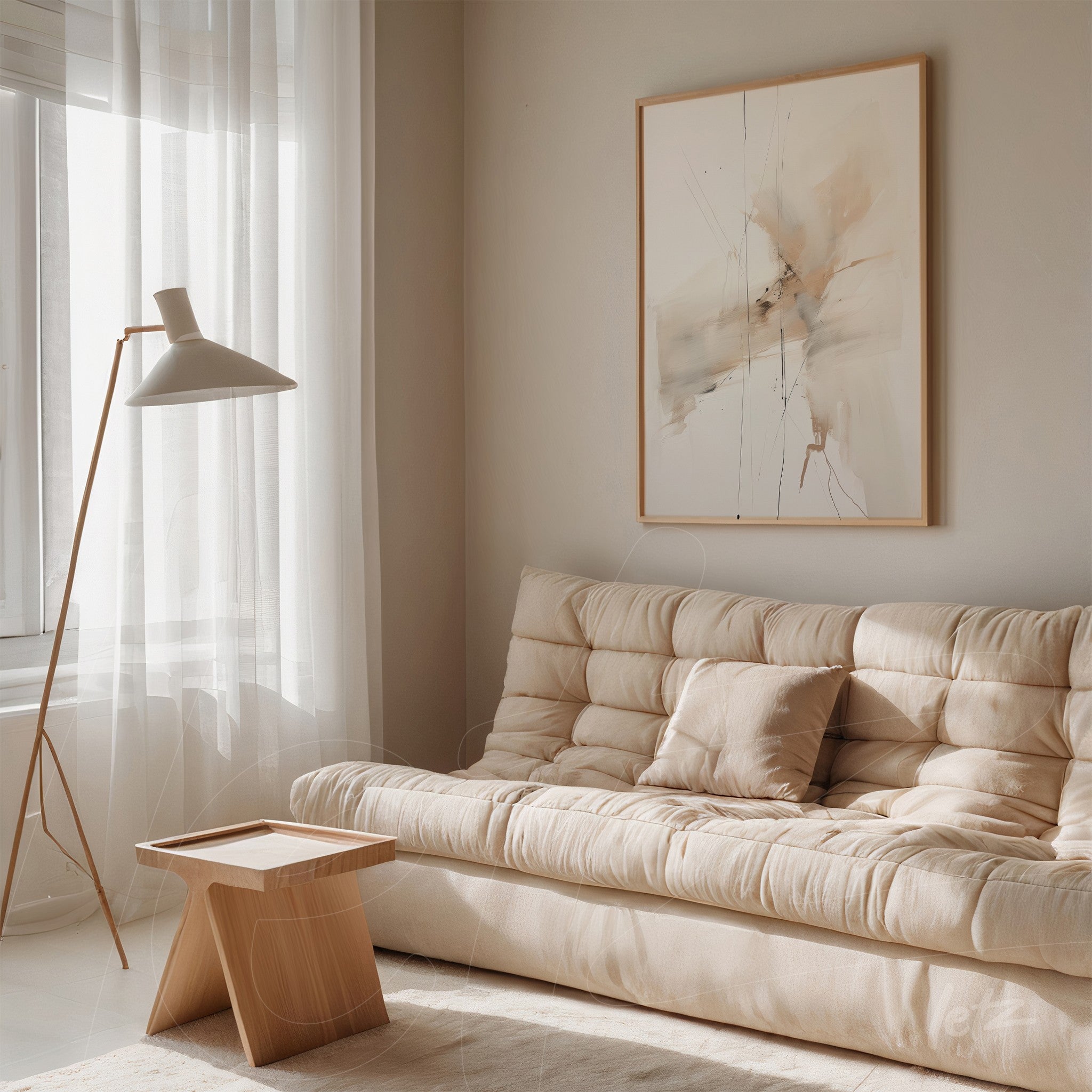 framed abstract artwork in neutral tones displayed on a well-lit living room wall
