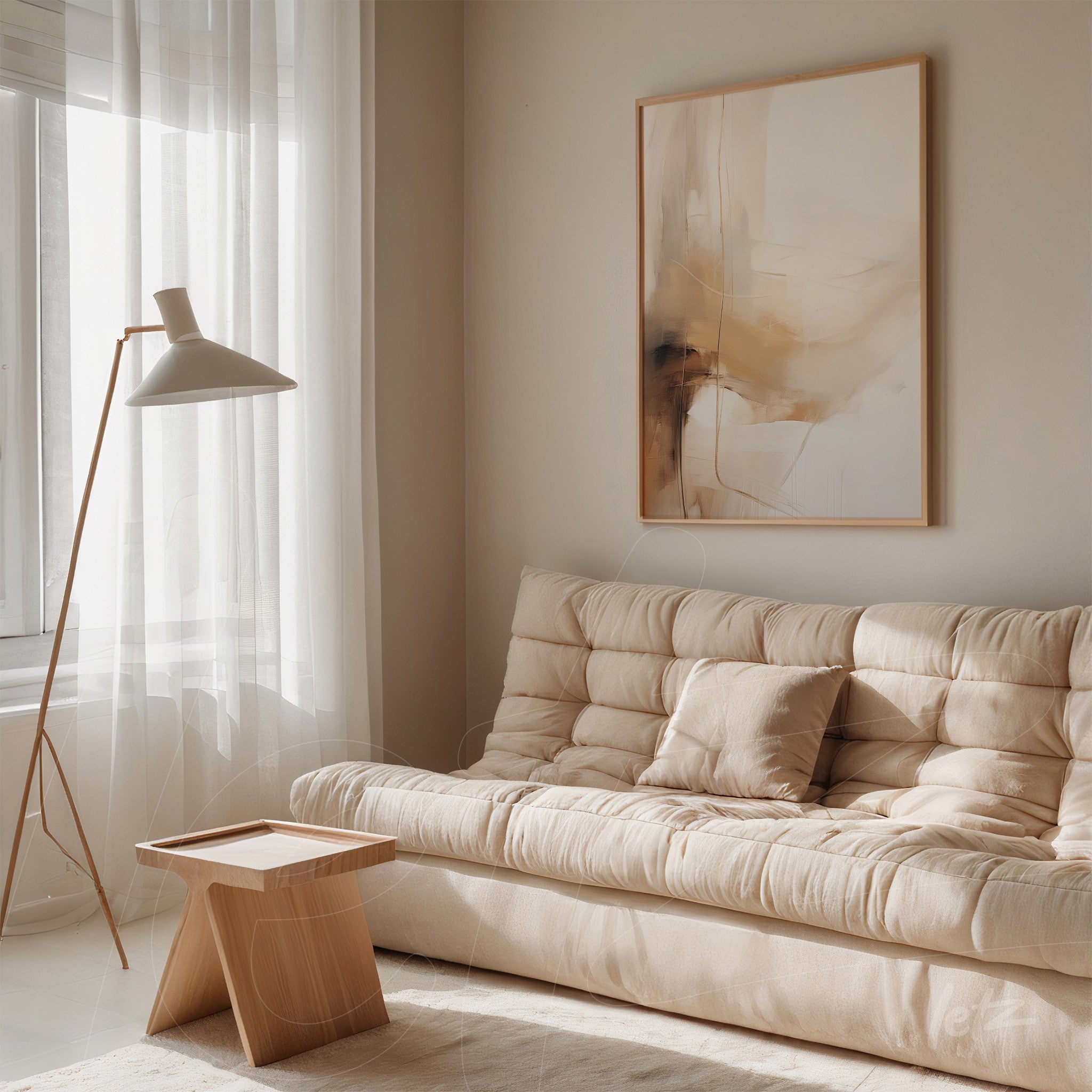 abstract wall art in light frame with earthy tones, adorning wall next to beige sofa
