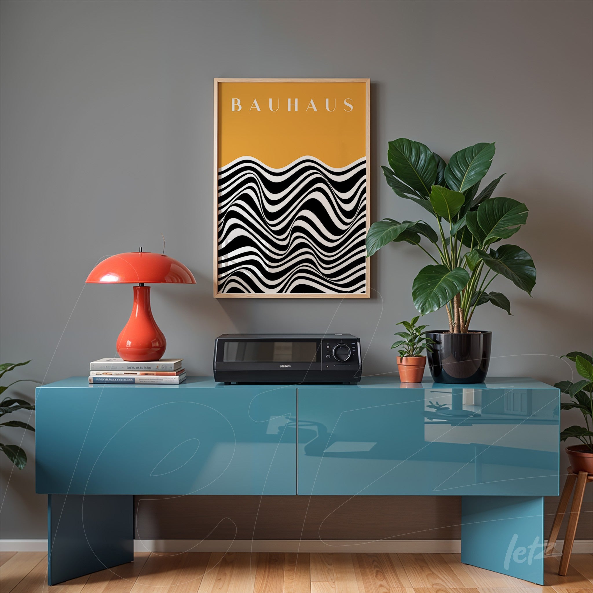 poster print with black and white abstract art in a light frame, displayed above a blue credenza