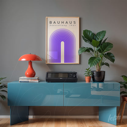 framed art inspired by the Bauhaus movement of 1923 in purple tones with a light frame