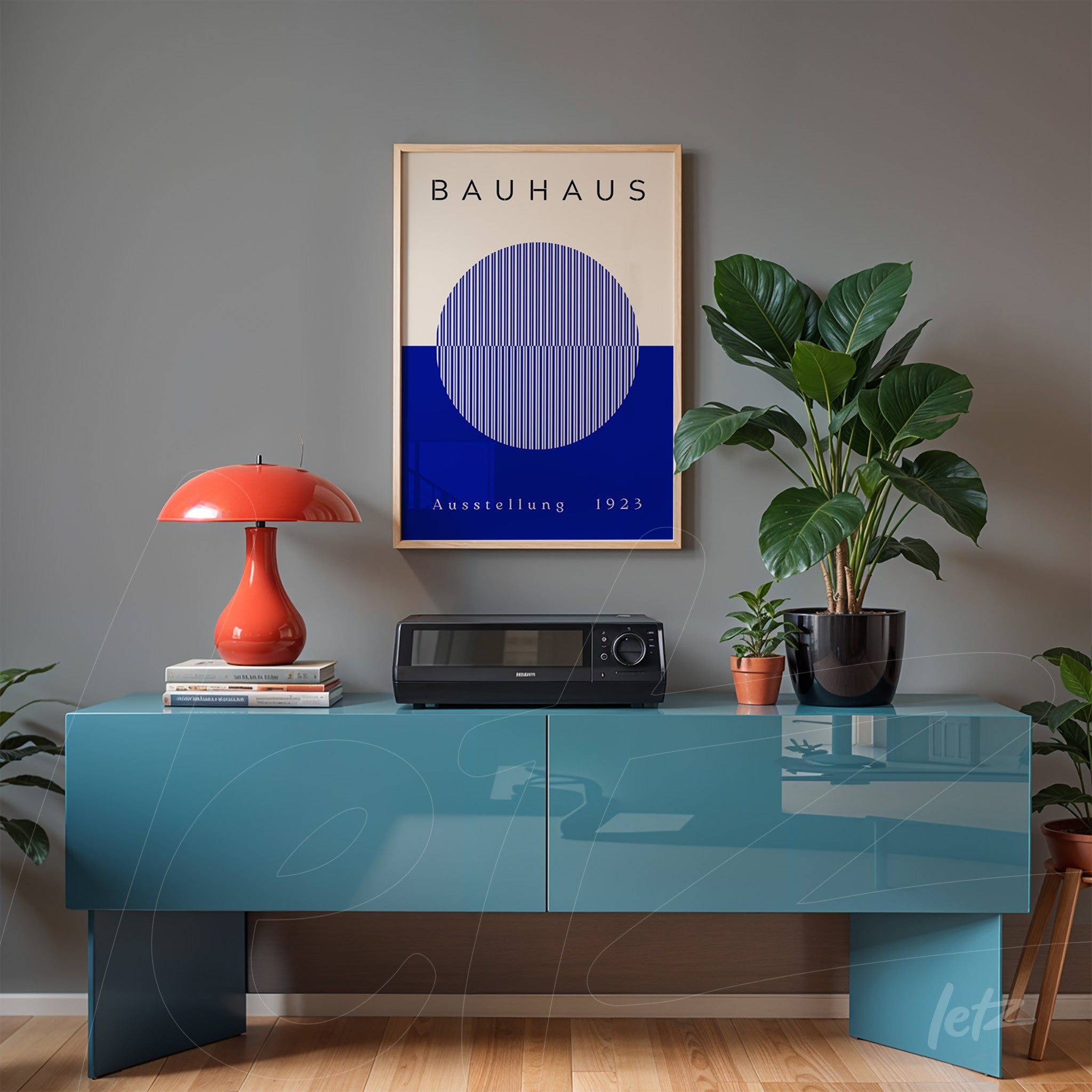 poster featuring geometric bauhaus design with light wood frame, adorning gray wall above a blue sideboard