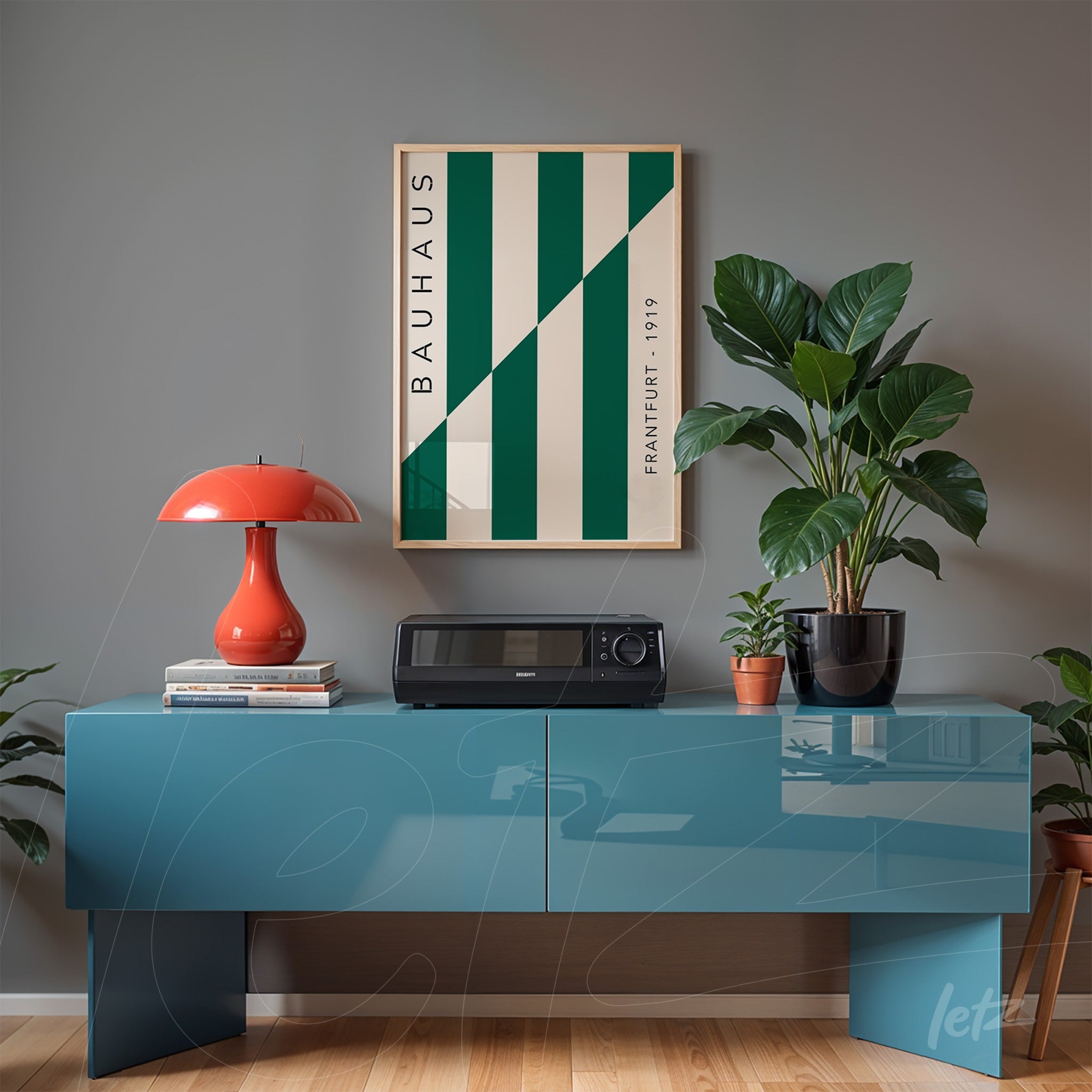 modern setting with minimalist bauhaus style poster in light frame on gray wall