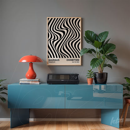 abstract black and white Bauhaus style poster in light wood frame